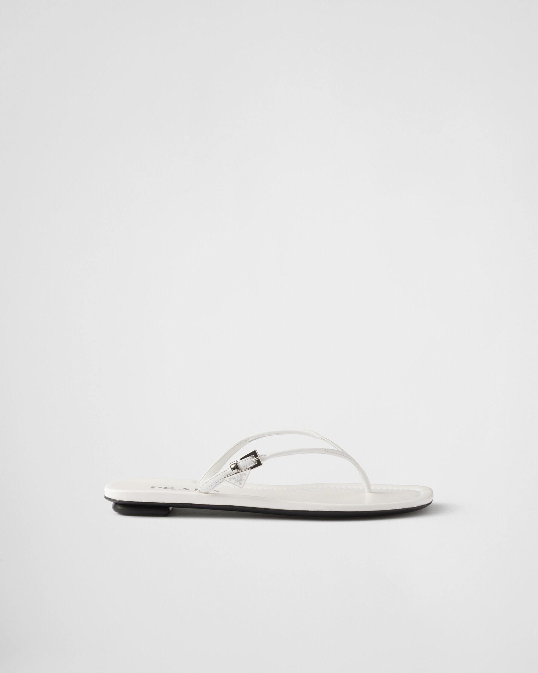 PRADA 25S SHUFFLE LEATHER THONG SANDALS IN IVORY CALFSKIN
