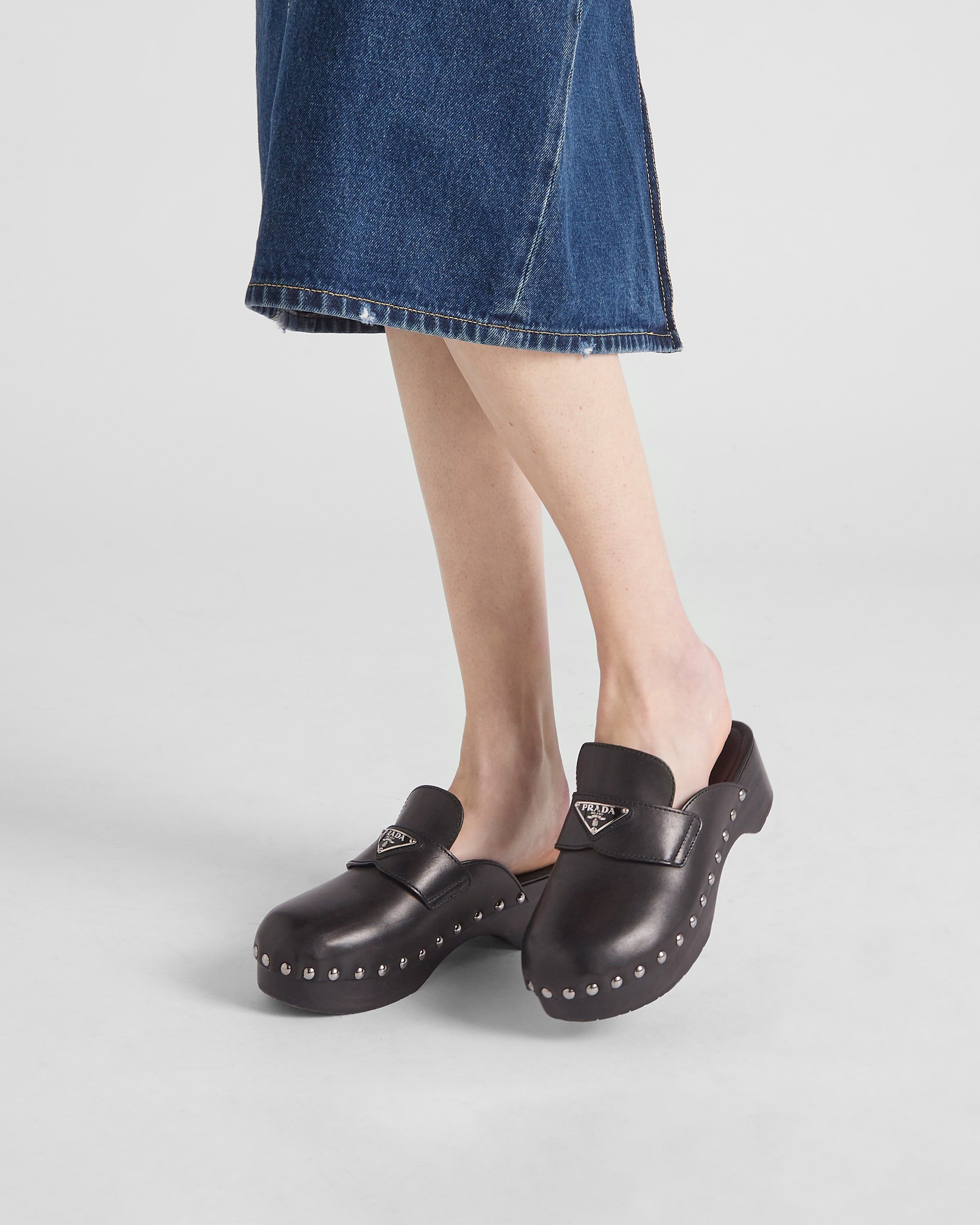 Studded leather clogs