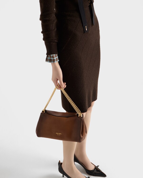 تنورة من الكشمير بنقش مخرم وقماش محبوك تنورة من الكشمير بنقش مخرم وقماش محبوك