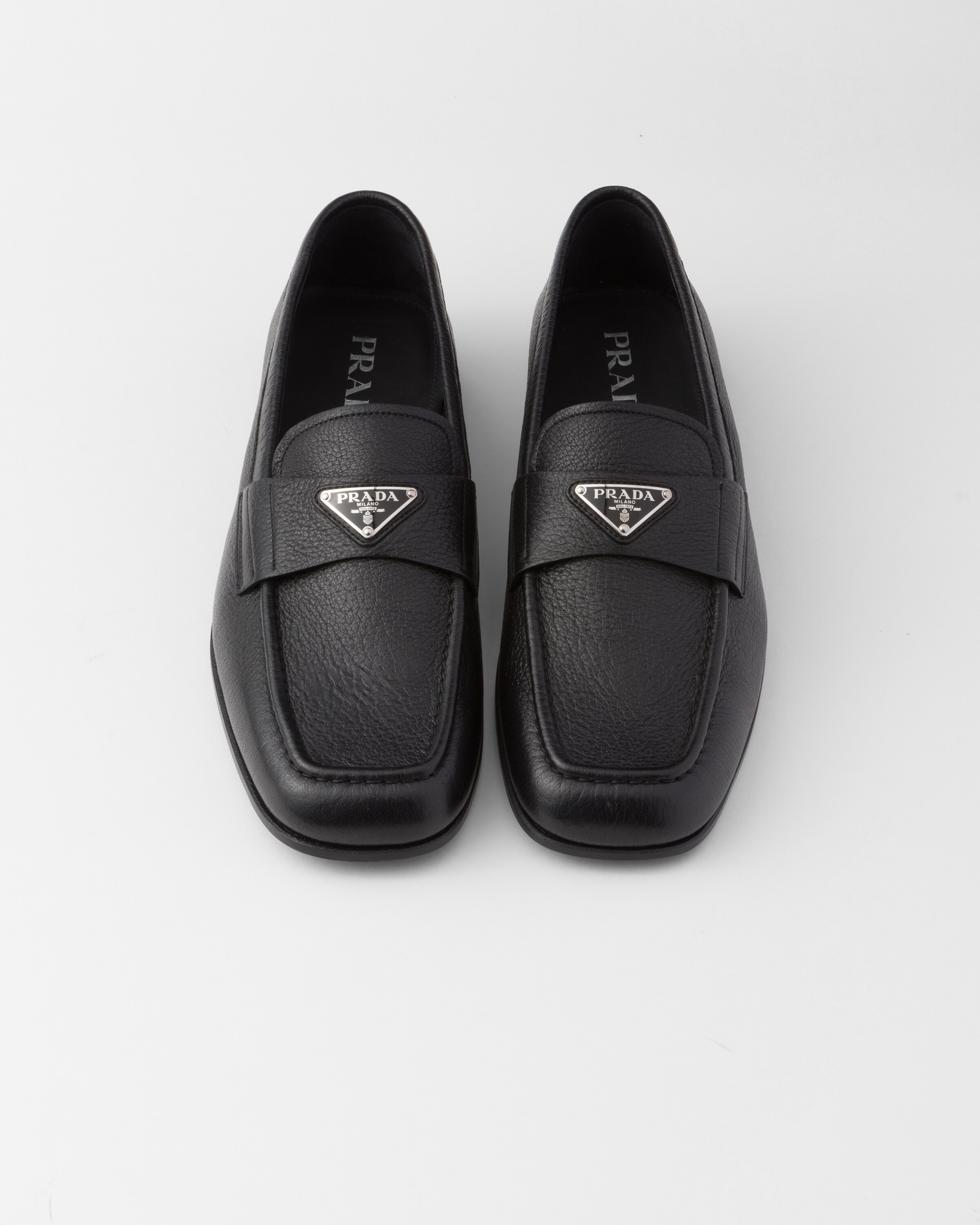 Shop Prada Leather Loafers In Black