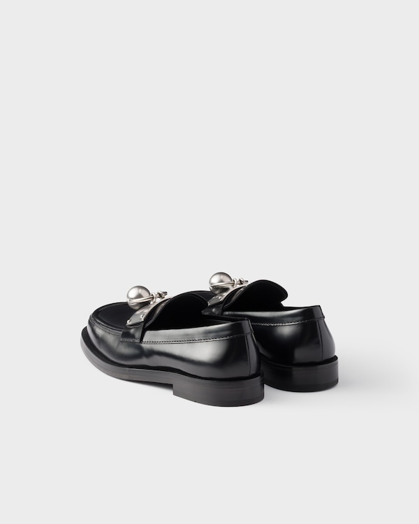 Brushed leather loafers with metal ring Brushed leather loafers with metal ring
