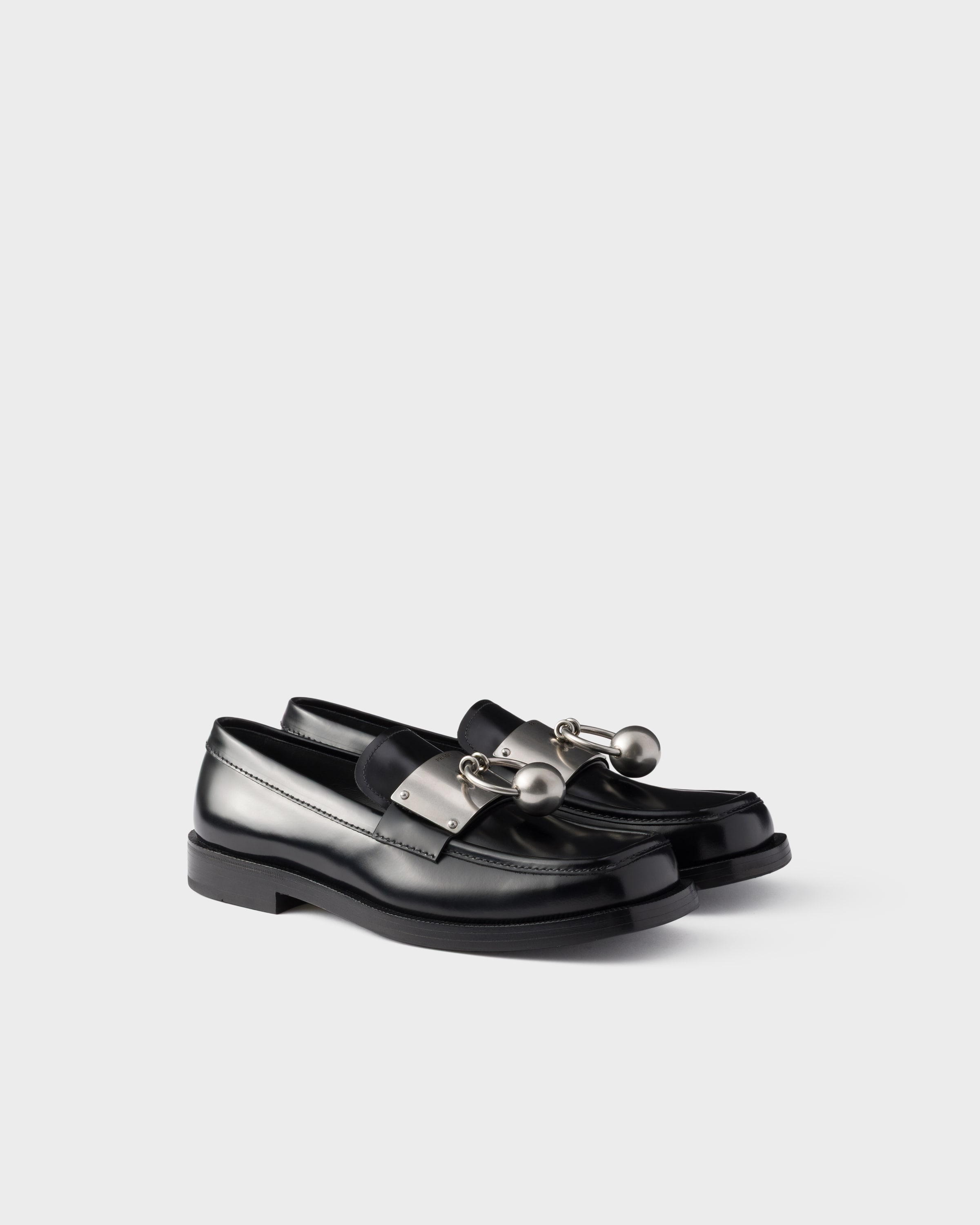 Prada Brushed Leather Loafers With Metal Ring In Black