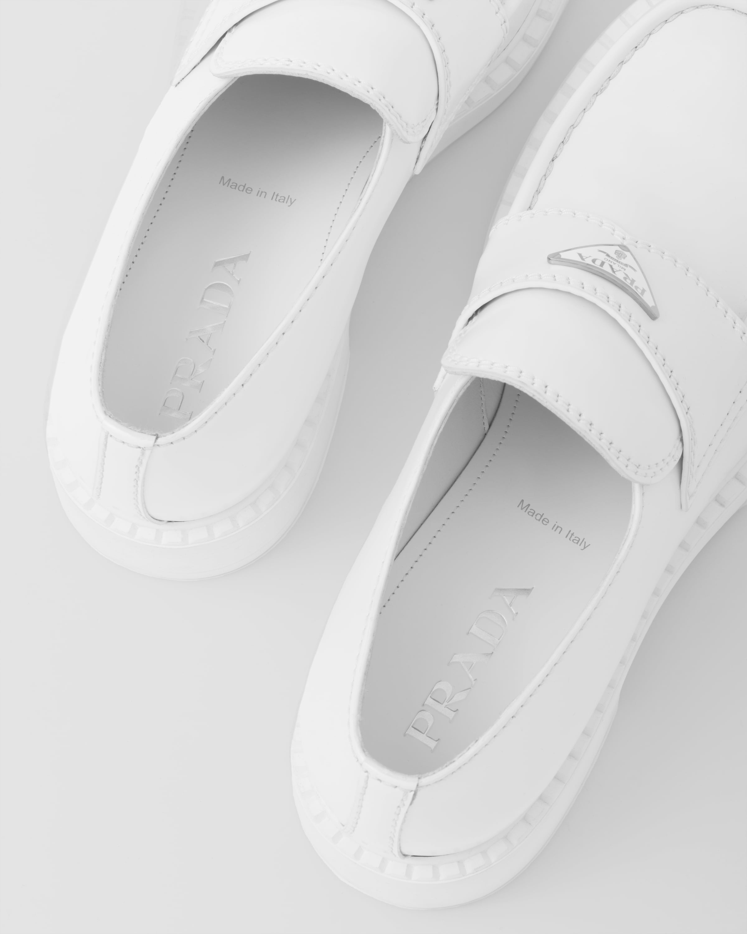 Prada outlet white loafers