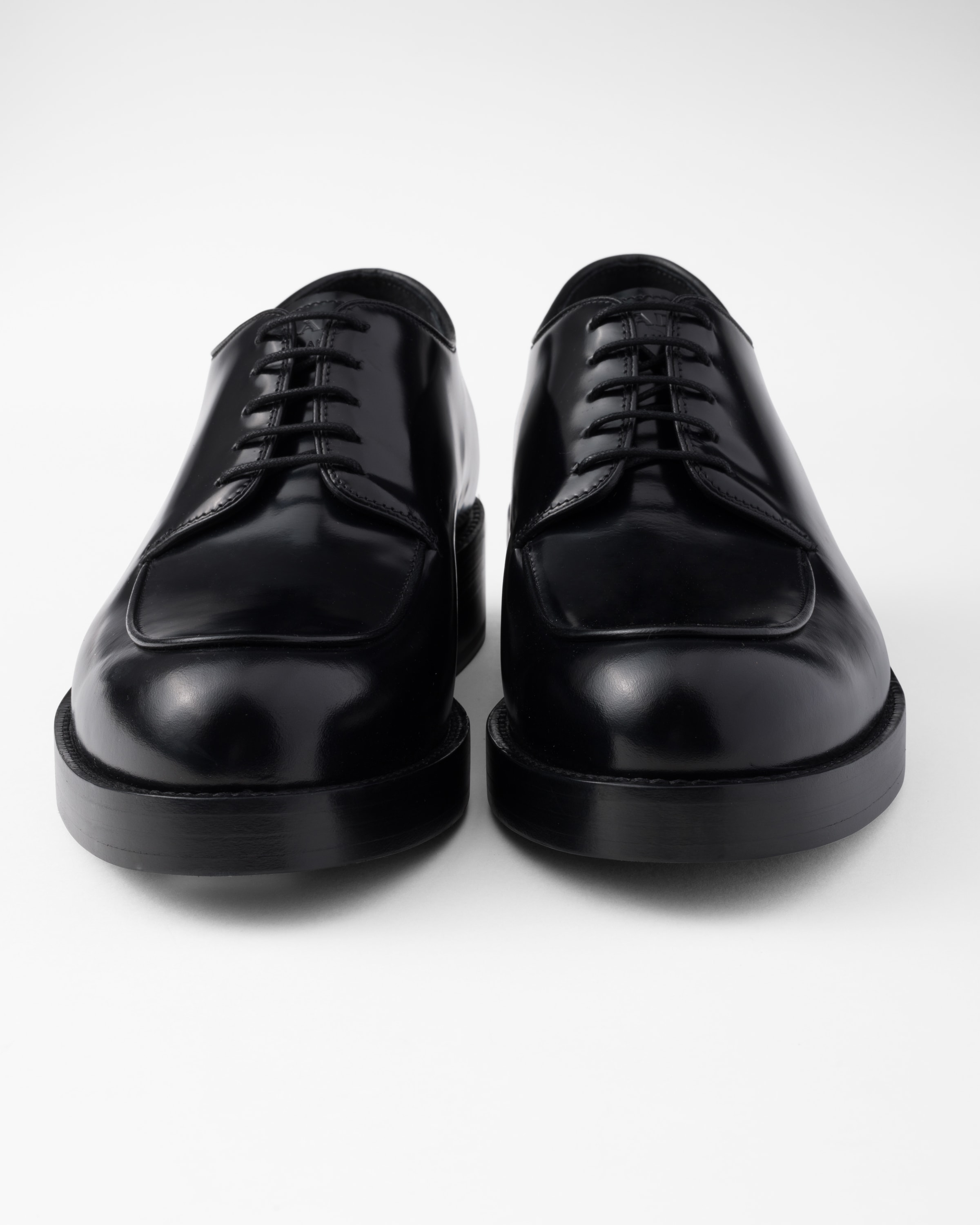 Prada - Leather lace-up derby shoes black - The Corner