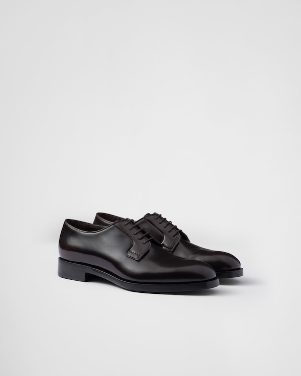 Black Brushed leather derby shoes | PRADA