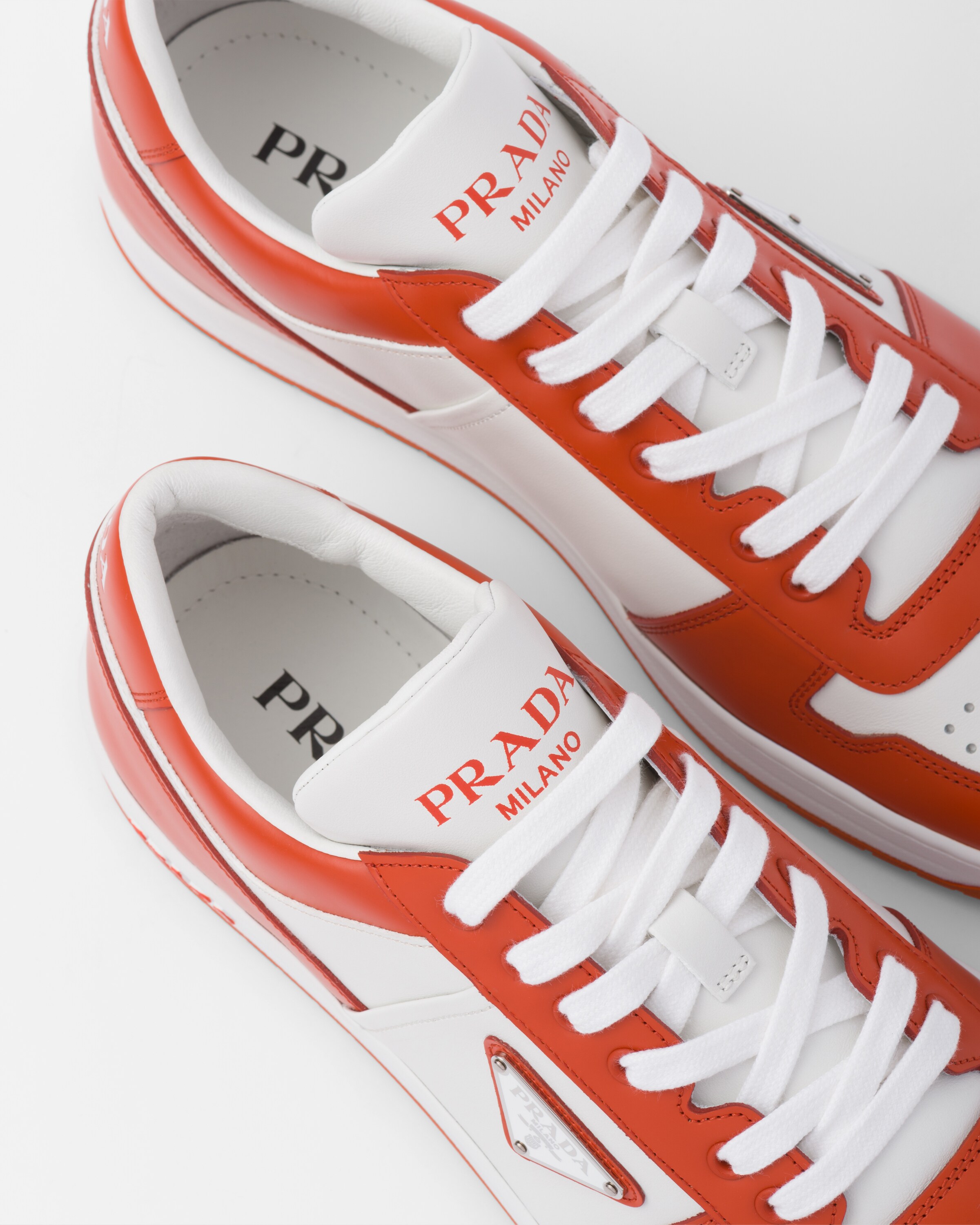 Prada orange sneakers top