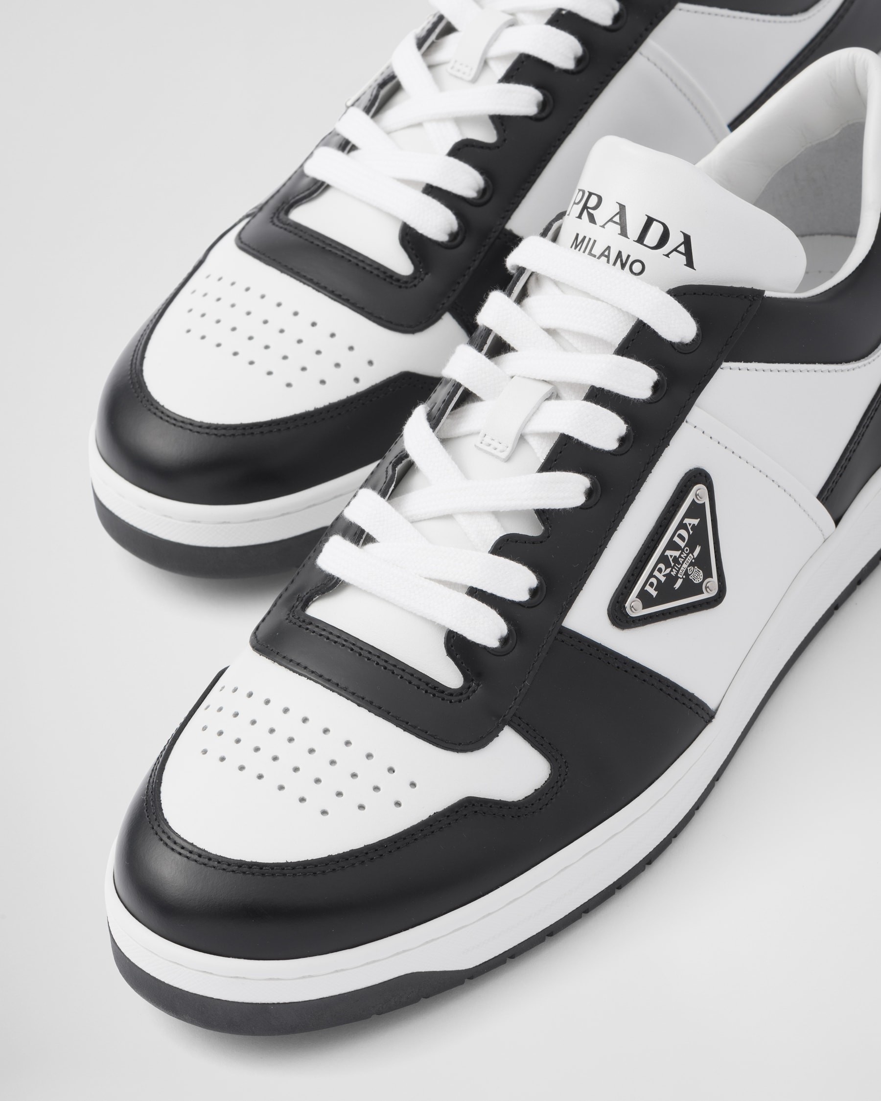 PRADA 25S DOWNTOWN SNEAKERS IN WHITE CALFSKIN SILVER HARDWARE main image 1