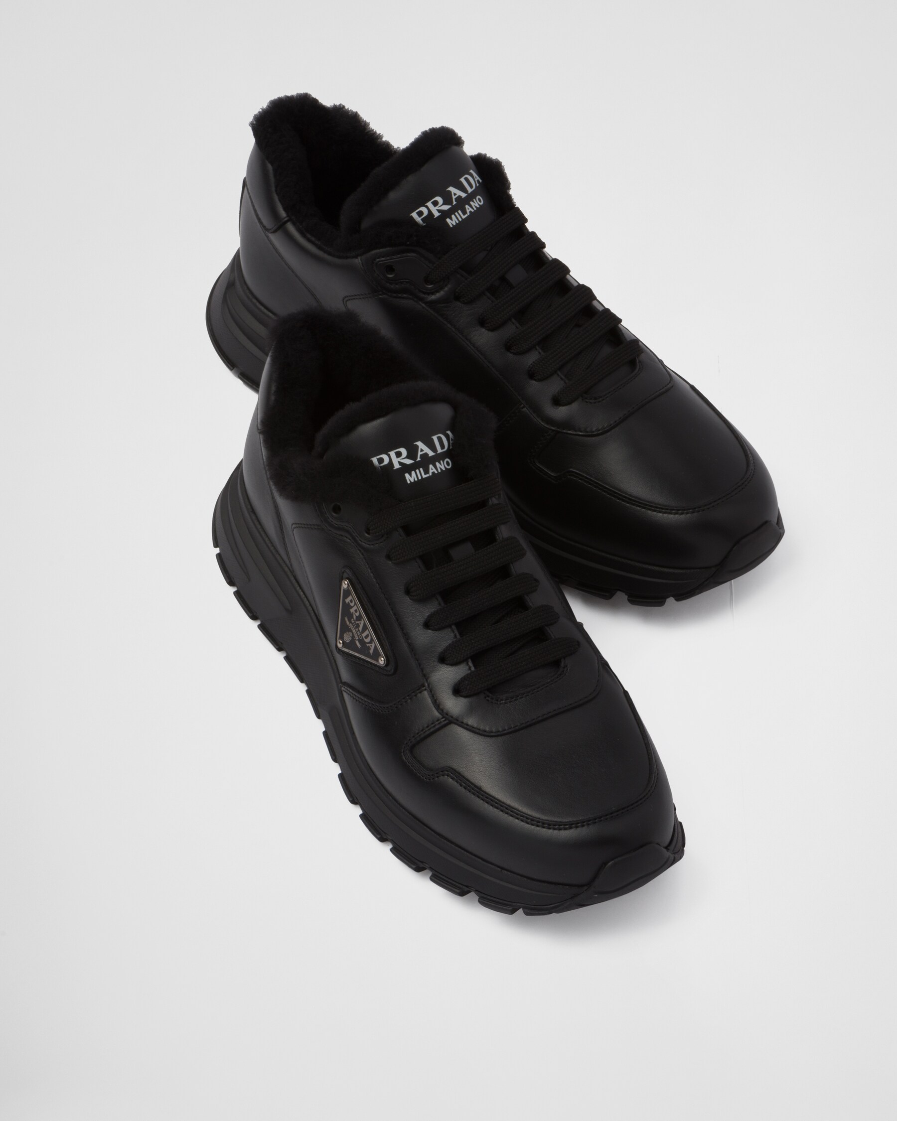 Black Prax 01 Leather An Shearling Sneakers PRADA black-prax-01-leather-an-shearling-sneakers-prada