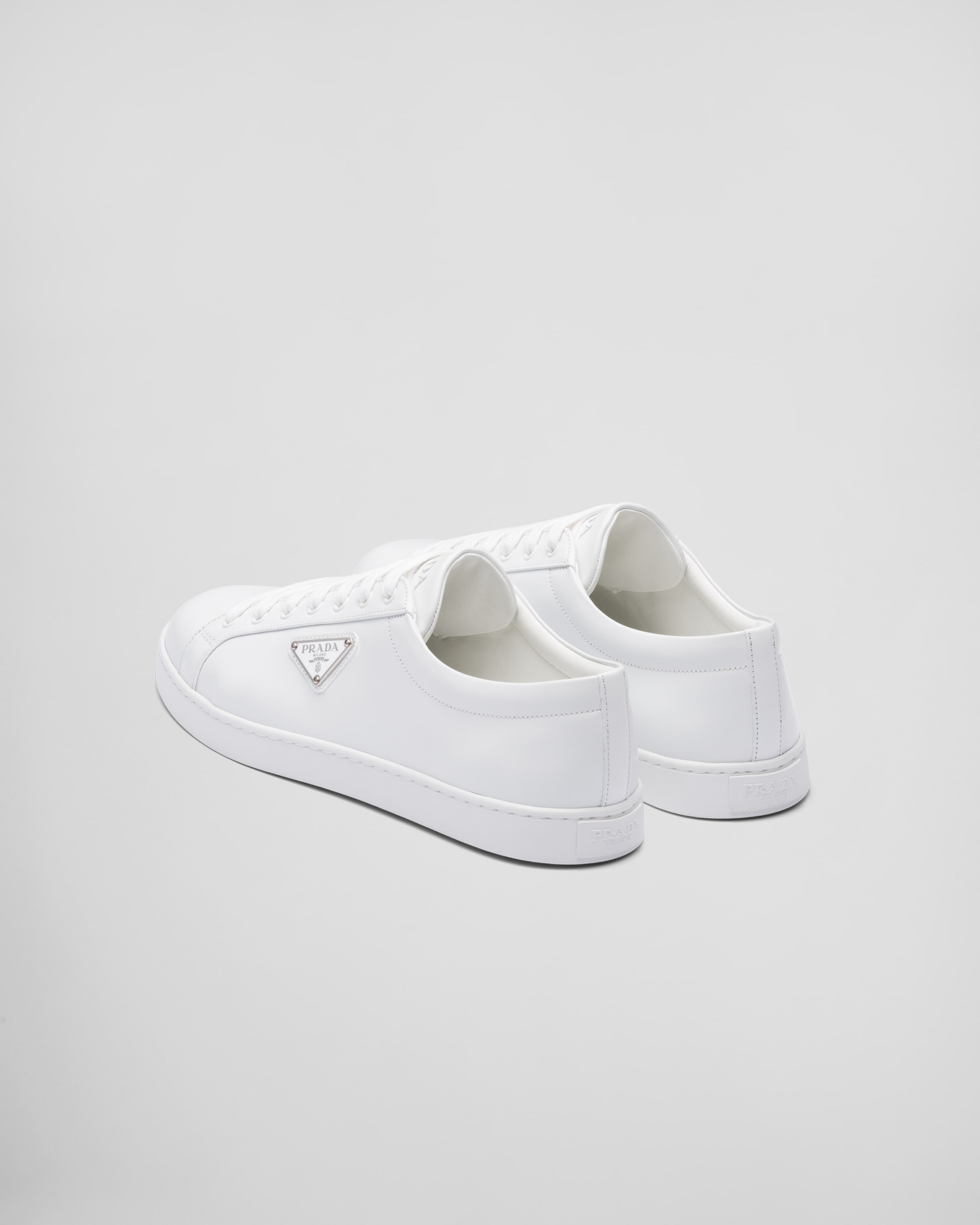 White Brushed leather sneakers | Prada