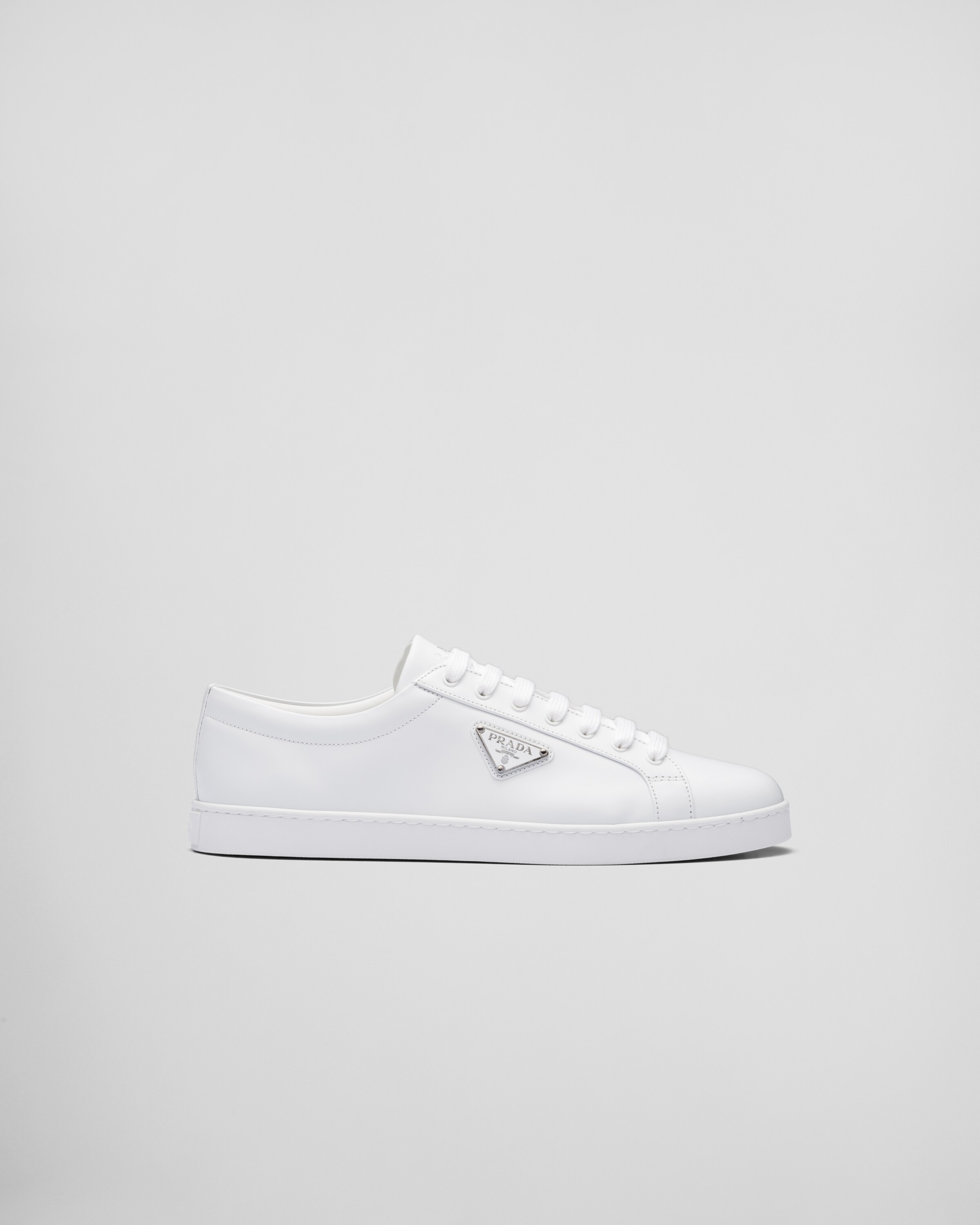 White Brushed leather sneakers | Prada