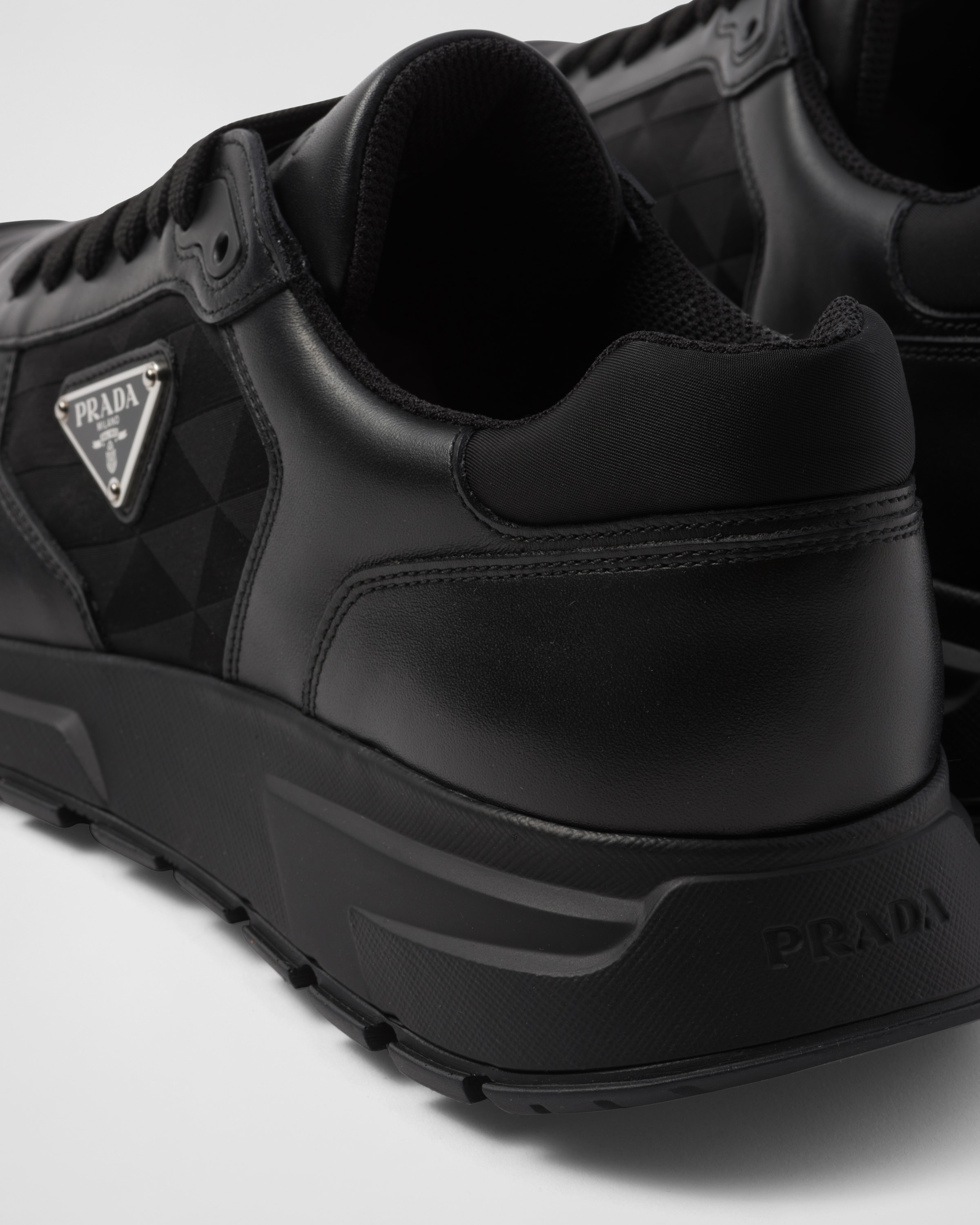 Black Leather And Re nylon High top Sneakers PRADA