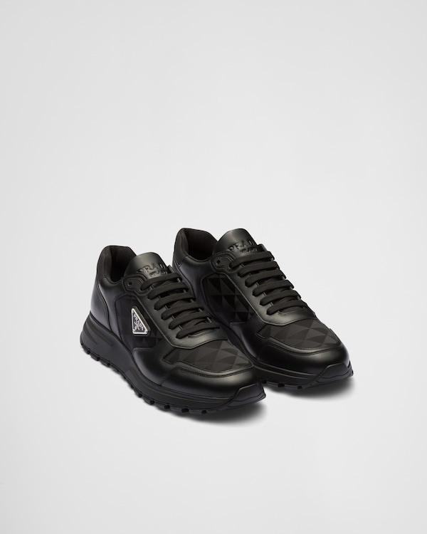 Black Leather and Re-Nylon sneakers | PRADA