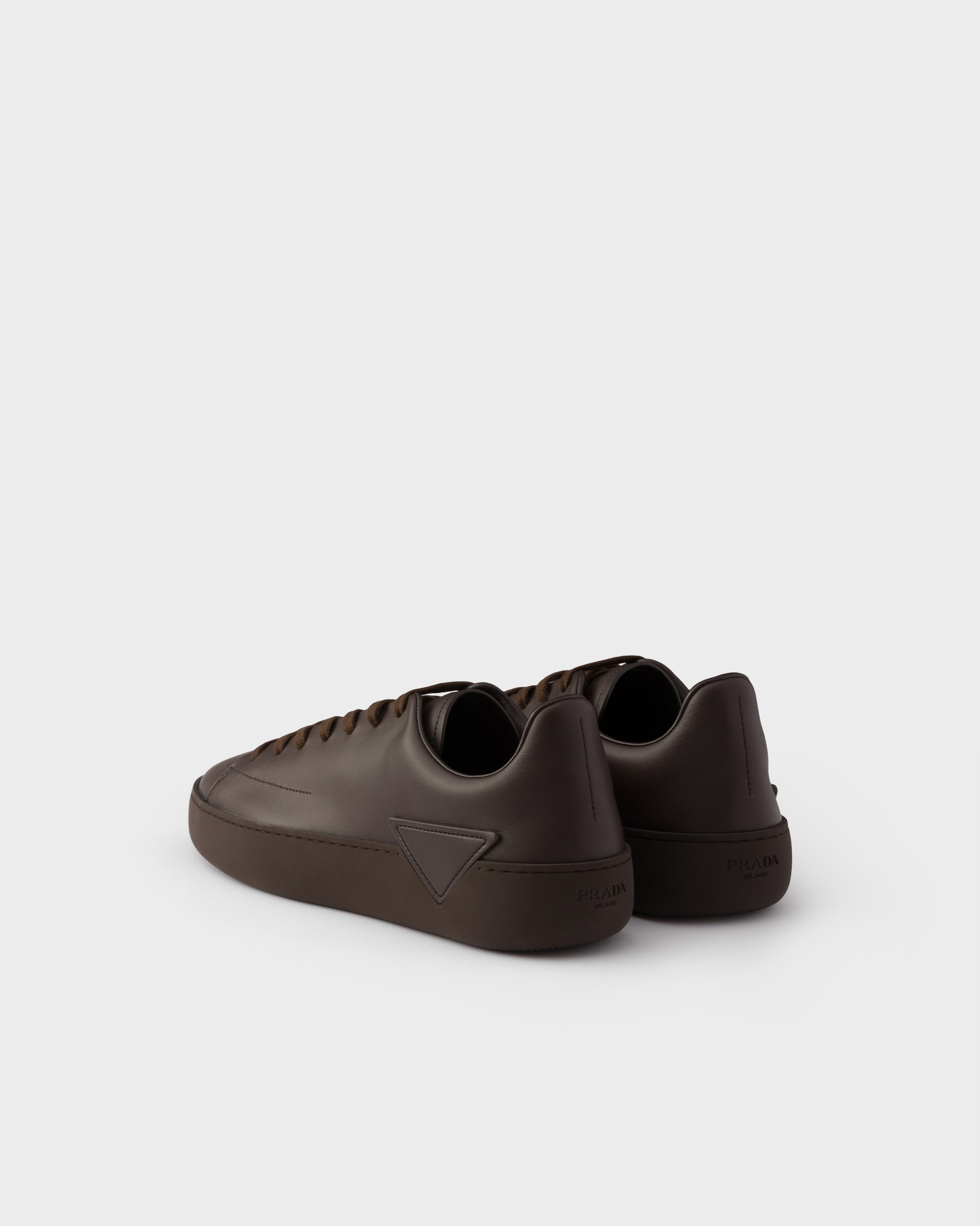 PRADA 12aw rubber sole shoes brown×black Coffee Court Leather Sneakers | PRADA - United States