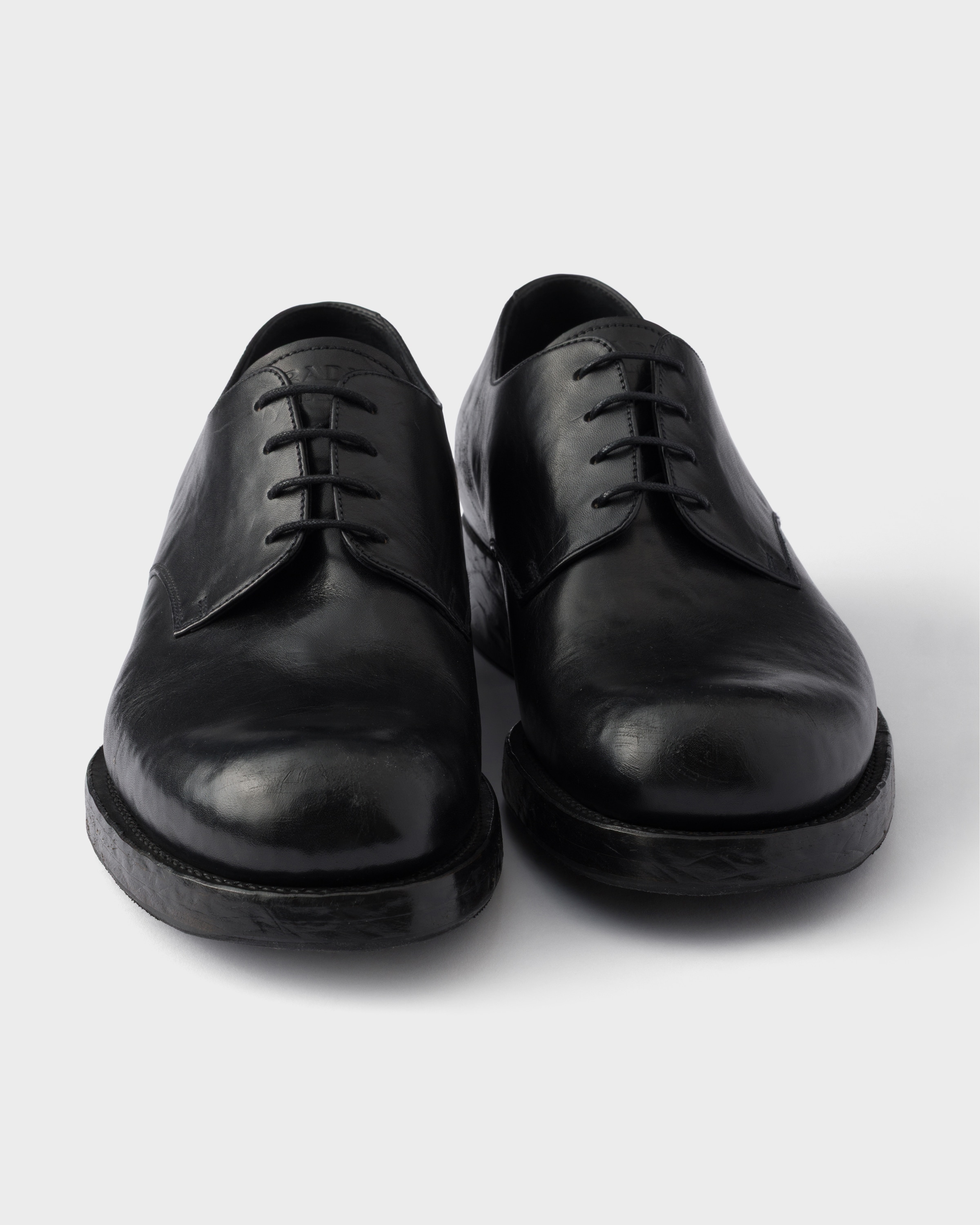 Black Antiqued Leather Lace-up Shoes | PRADA - United States