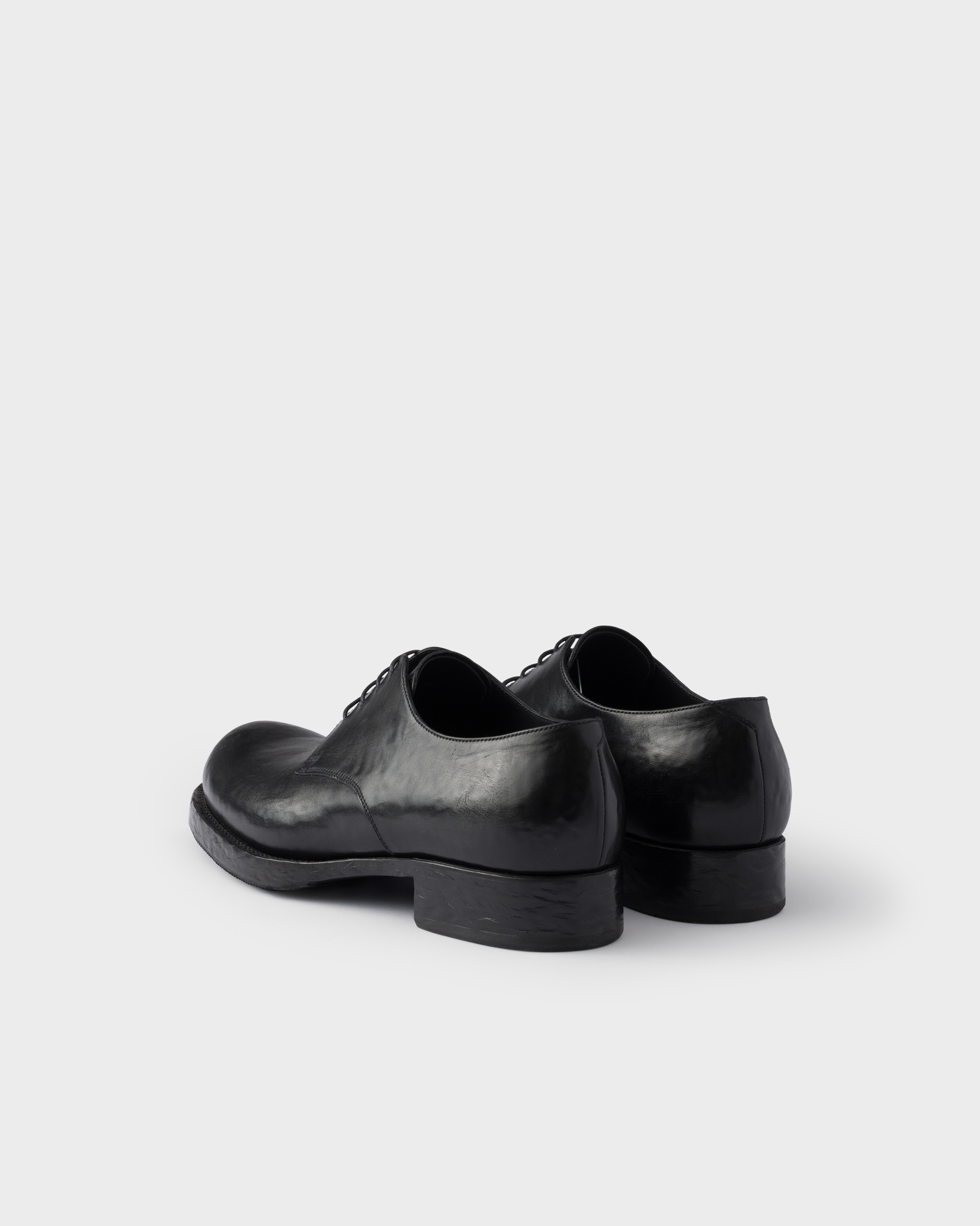 Black Antiqued Leather Lace-up Shoes | PRADA - United States
