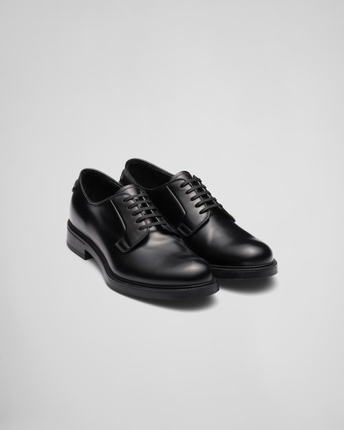 Black leather derby shoes Prada