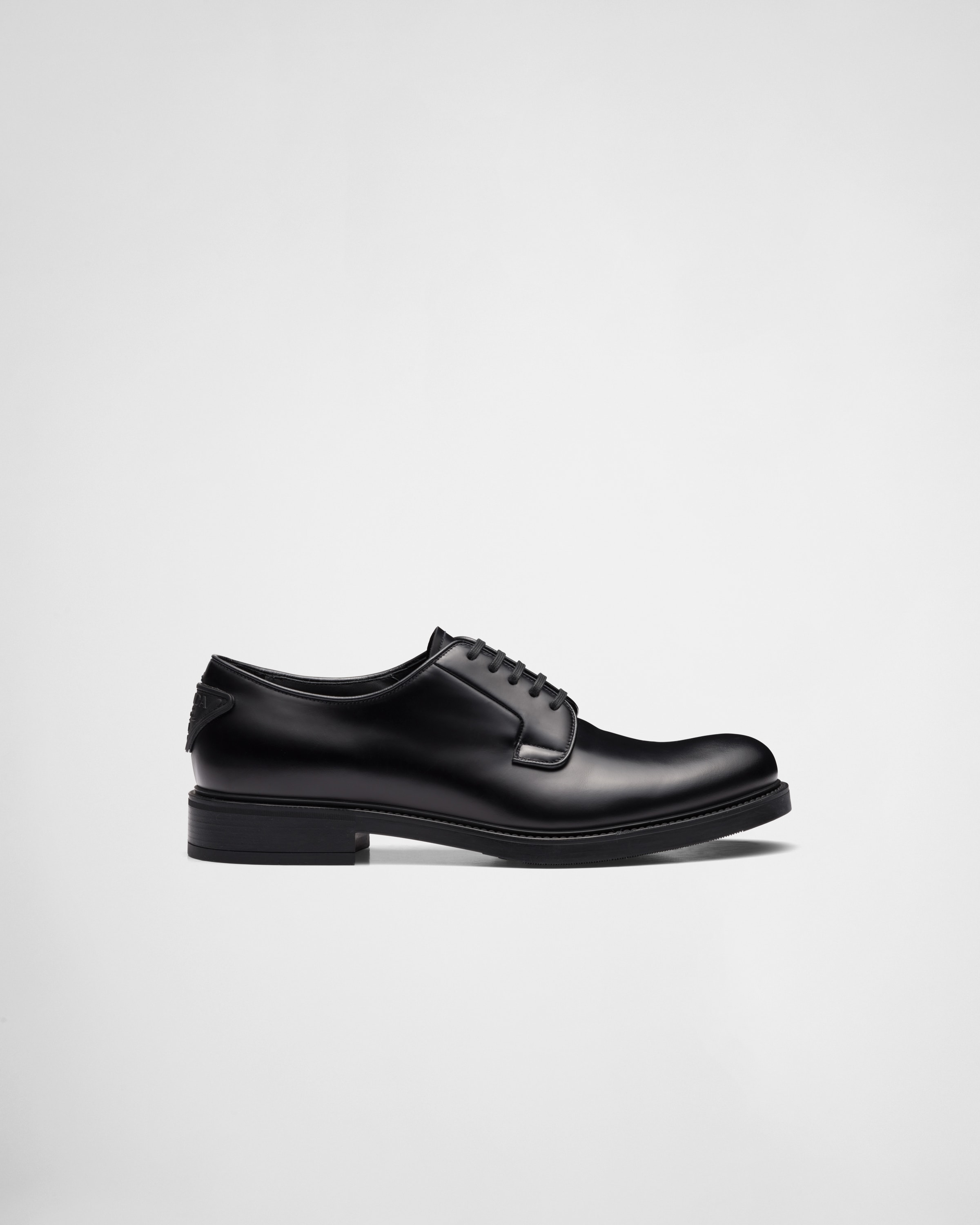 Black Brushed leather derby shoes | Prada