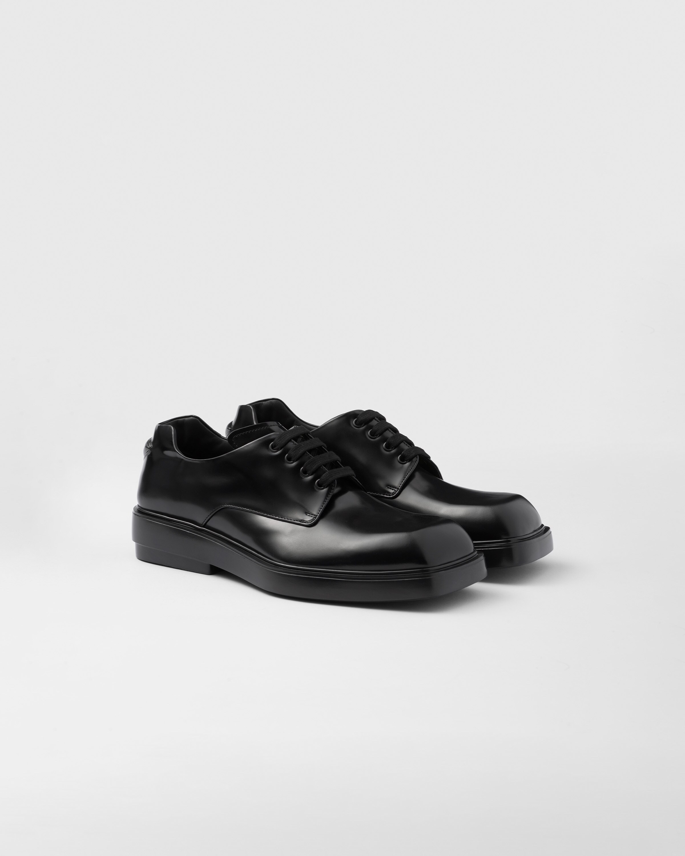 Prada Fender Brushed Leather Derby Shoes In Black | ModeSens