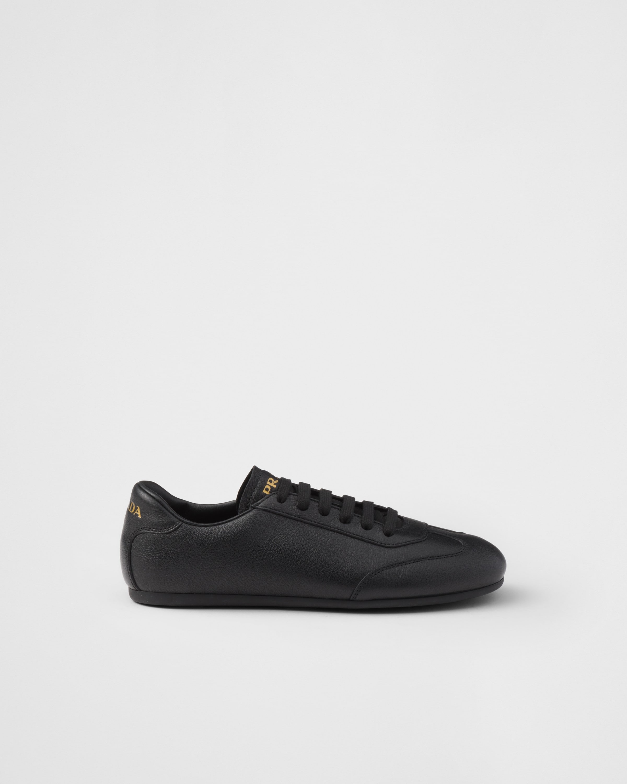 Shop Prada Leather Sneakers In Black