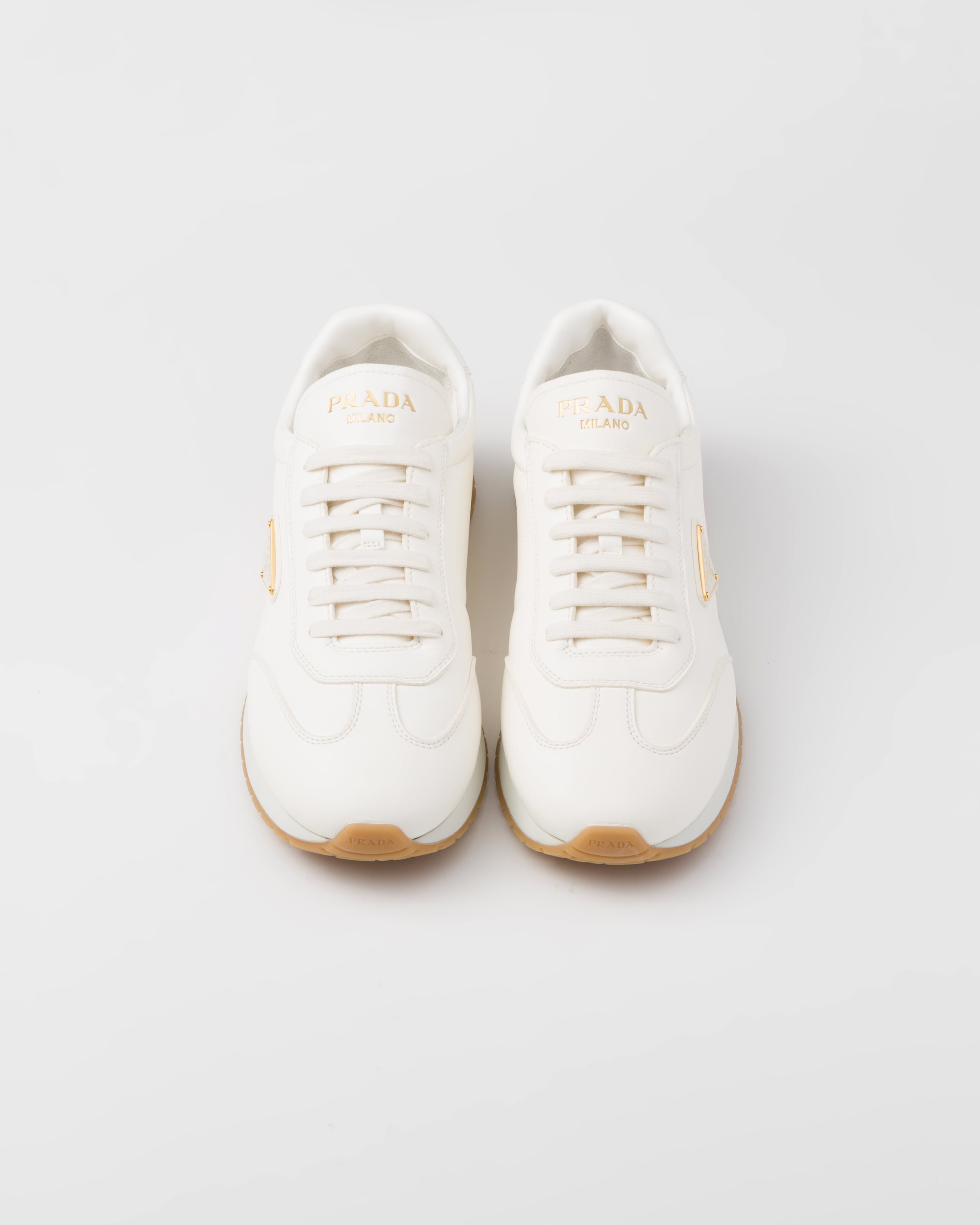 Prada embellished leather sneakers clearance