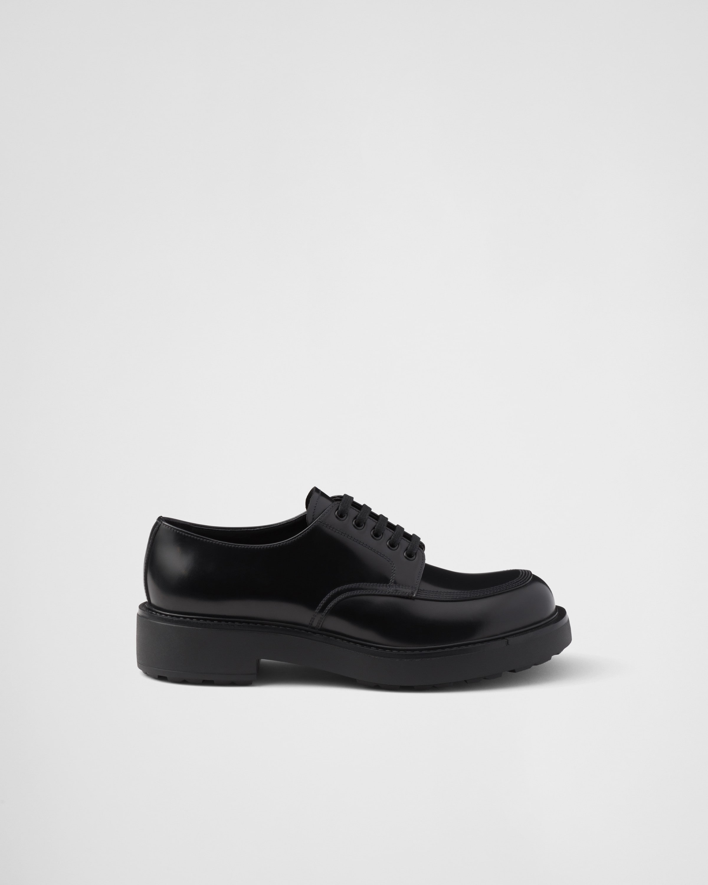 Shop Prada Brushed Leather Derby Shoes In Black