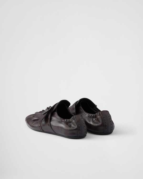 Chaussures Shuffle à boucle et frange Chaussures Shuffle à boucle et frange