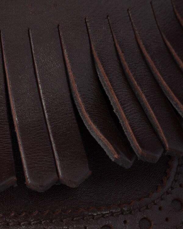 Chaussures Shuffle à boucle et frange Chaussures Shuffle à boucle et frange