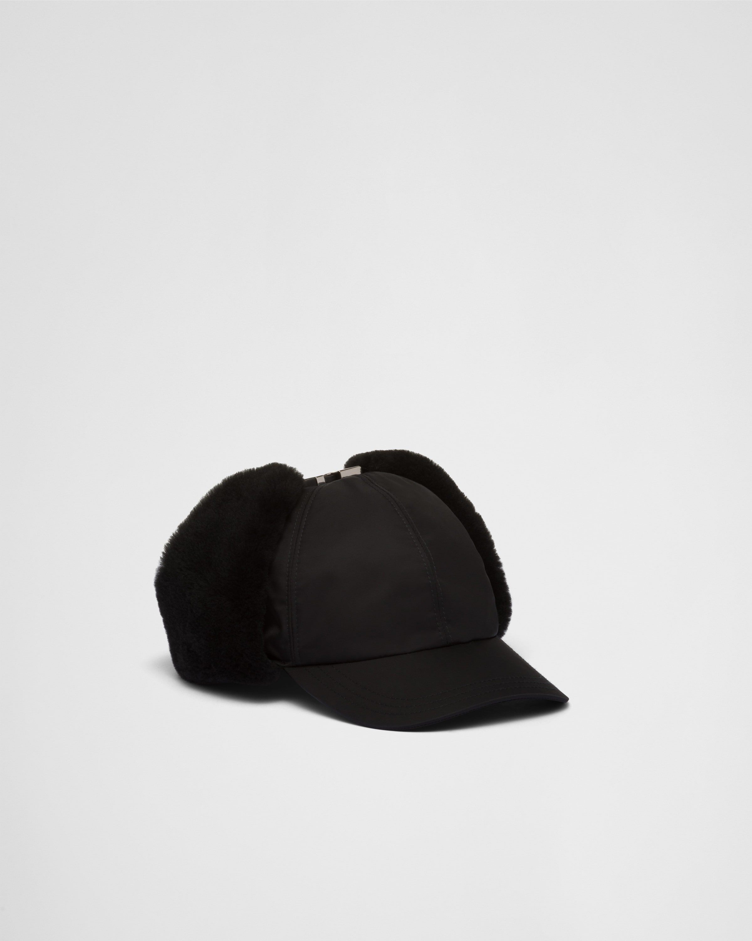 Shop Prada Re-nylon And Shearling Hat In Black