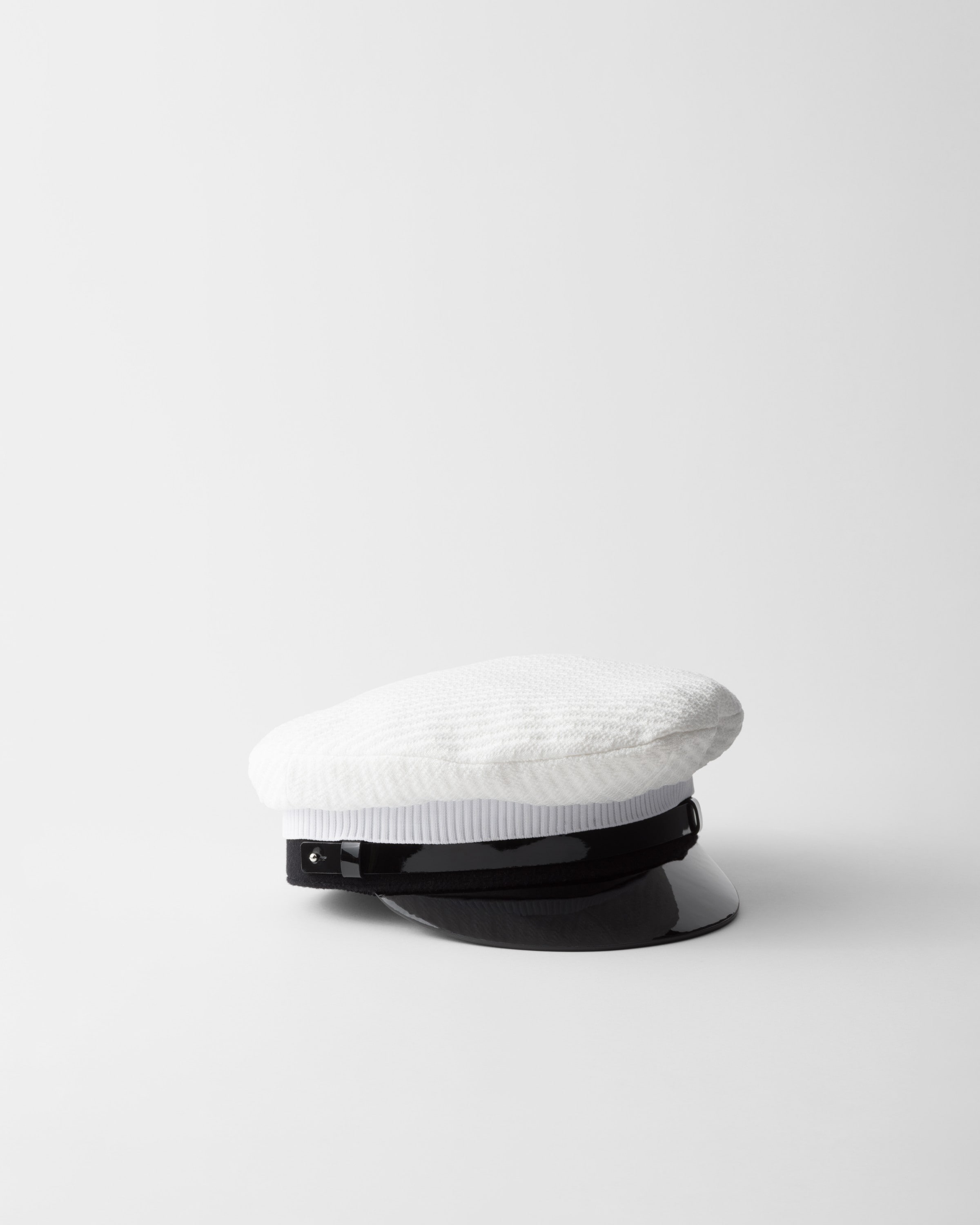 Prada Knit And Patent Leather Cap In White/black