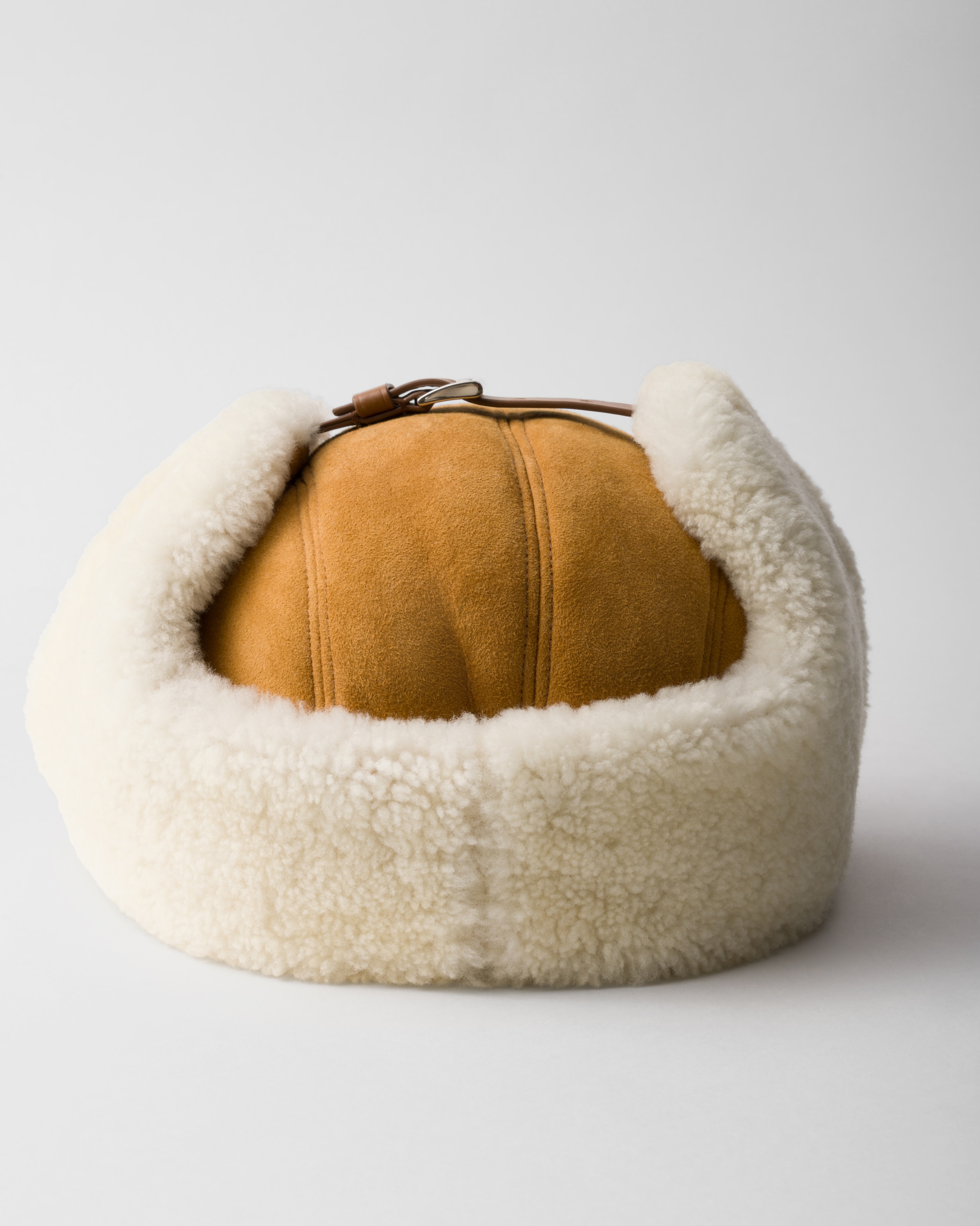 Prada Mens Neutral Shearling Suede Trapper Hat In Honig