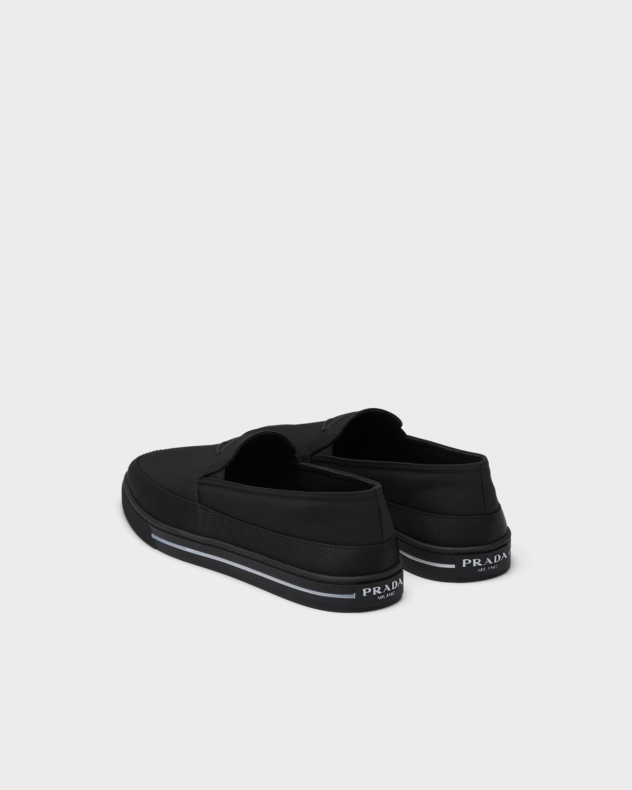Prada Re-nylon Slip-on Sneakers In Animal Print