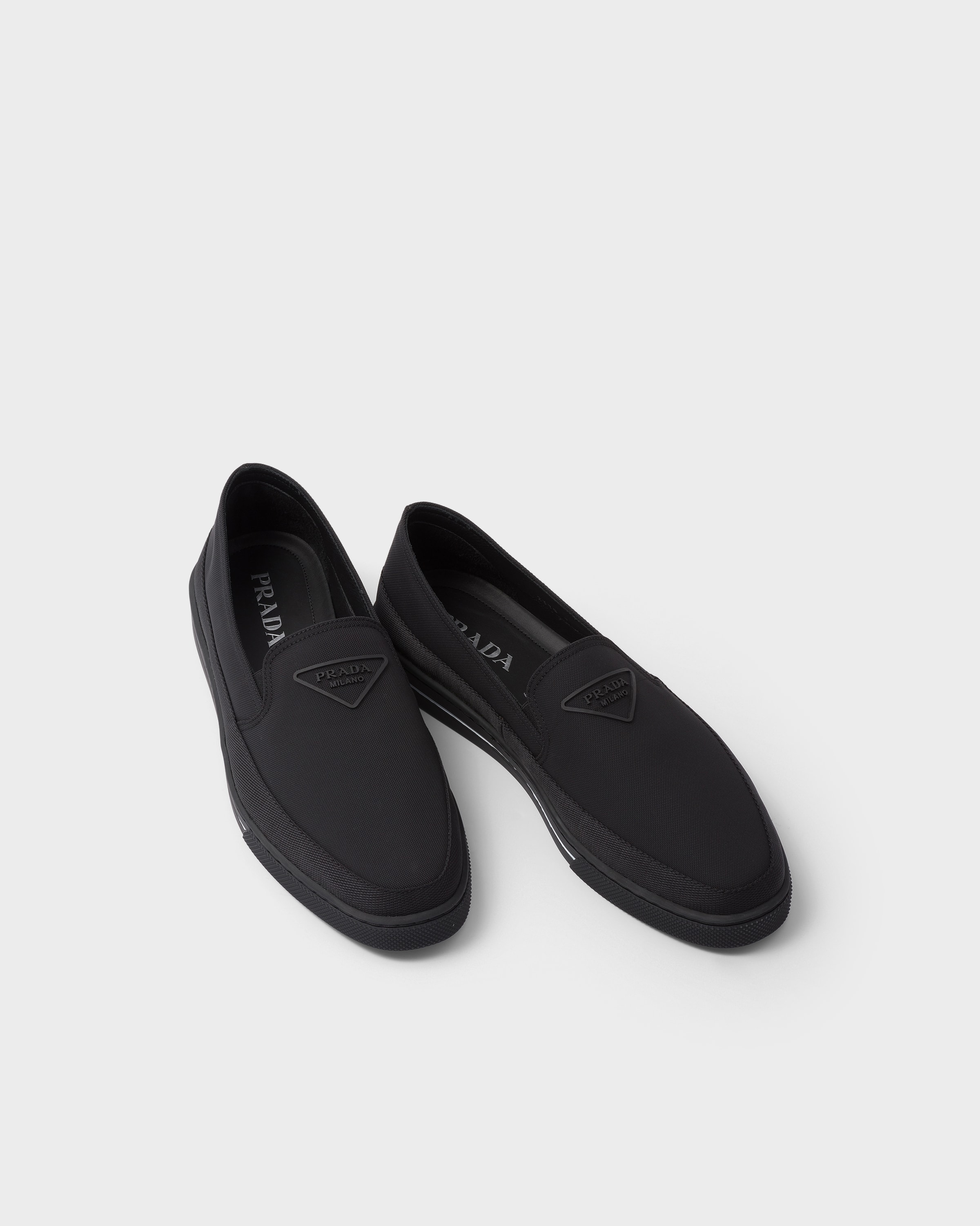 Prada Re-nylon Slip-on Sneakers In Animal Print