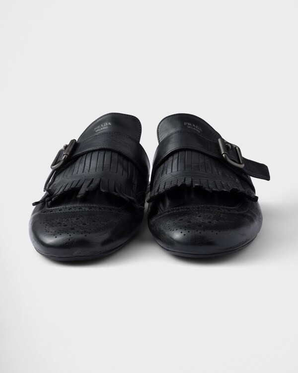 Shuffle antiqued leather mules with buckled strap and fringe - Black Shuffle antiqued leather mules with buckled strap and fringe - Black