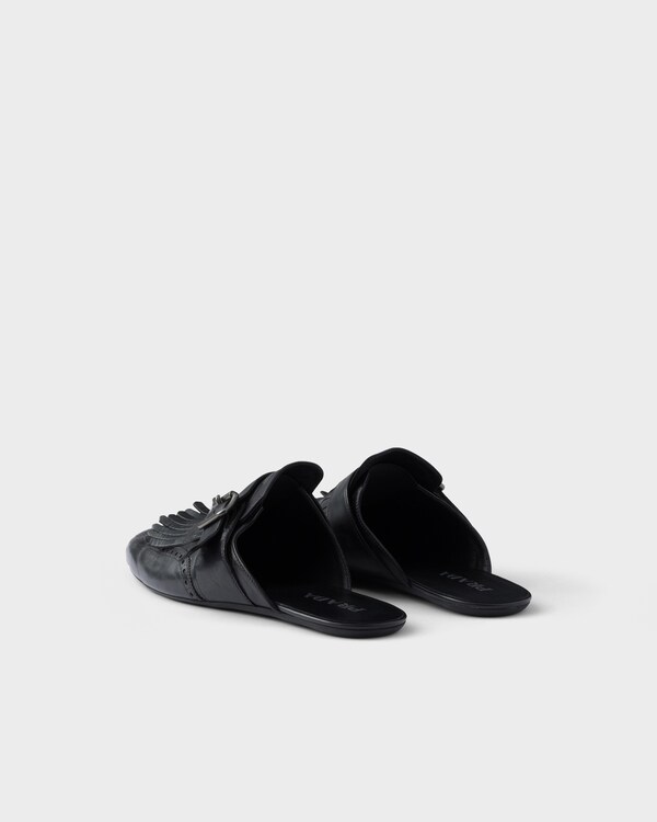 Shuffle antiqued leather mules with buckled strap and fringe - Black Shuffle antiqued leather mules with buckled strap and fringe - Black