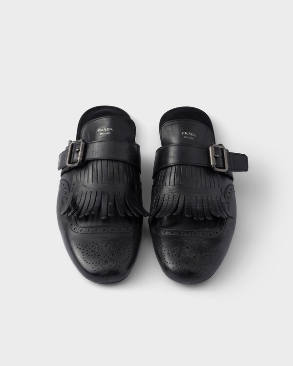 Shuffle antiqued leather mules with buckled strap and fringe - Black Shuffle antiqued leather mules with buckled strap and fringe - Black