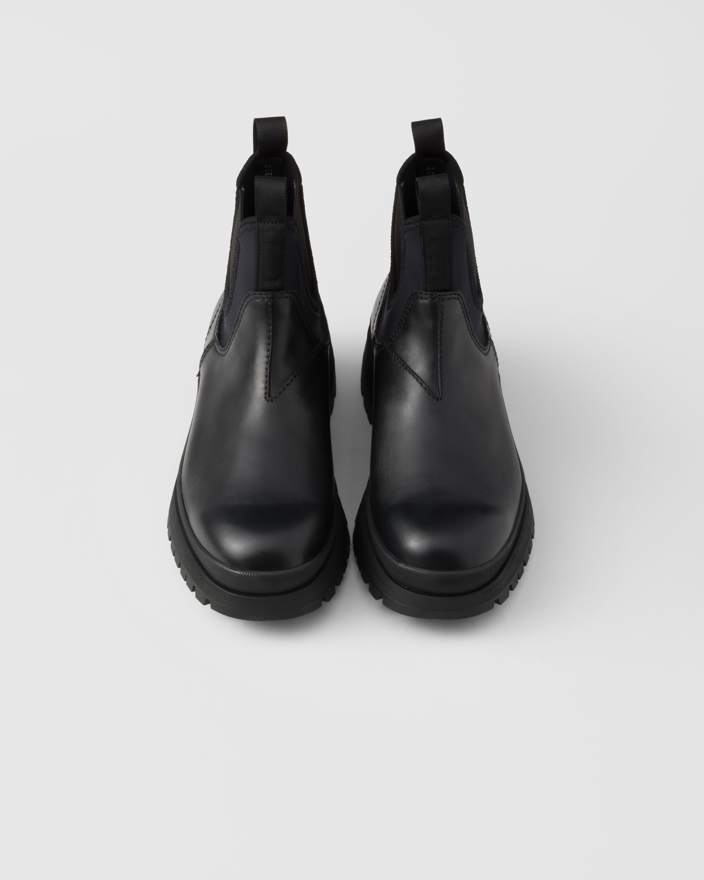 【日本入手困難】プラダ Brixxen leather booties ブーツ Black Leather And Stretch Fabric Brixxen Boots | PRADA