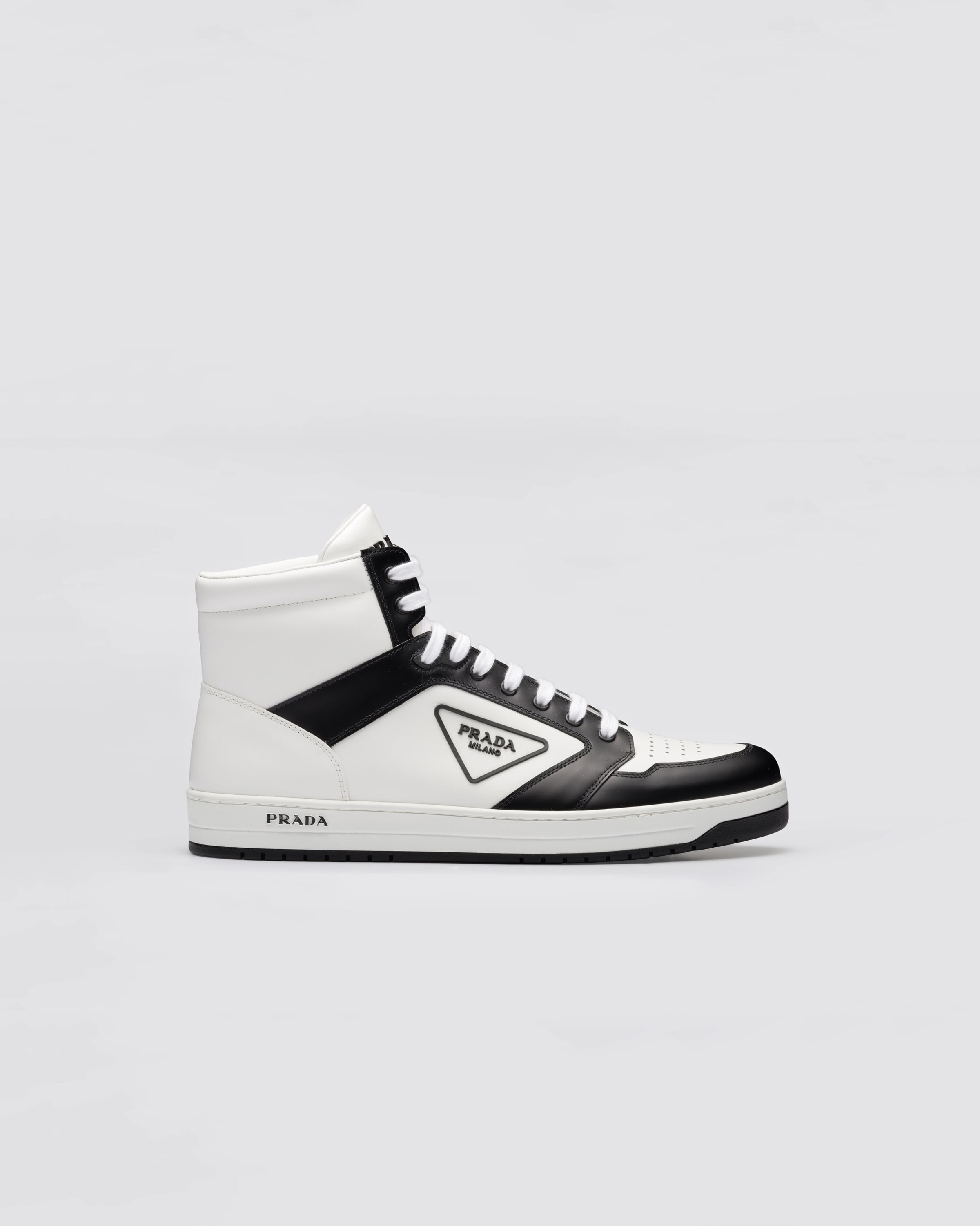 White/black District leather sneakers | Prada