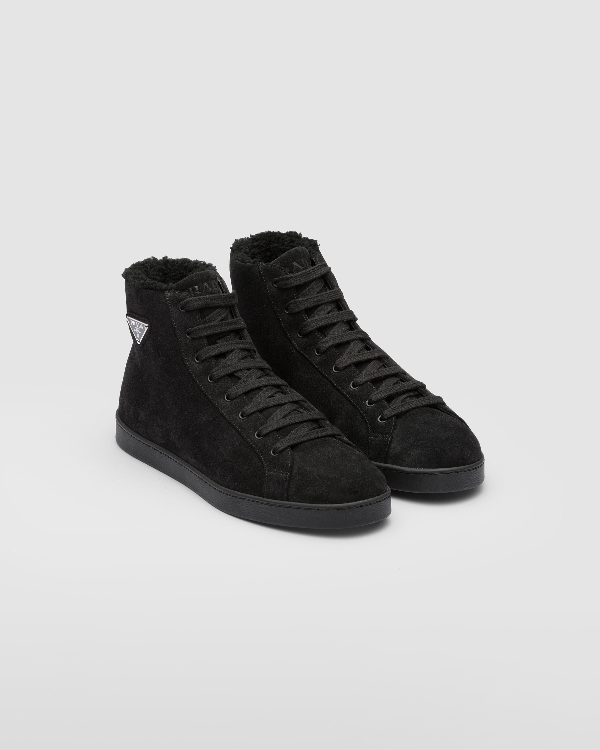 Soft and Stylish: Black Suede Prada Sneakers