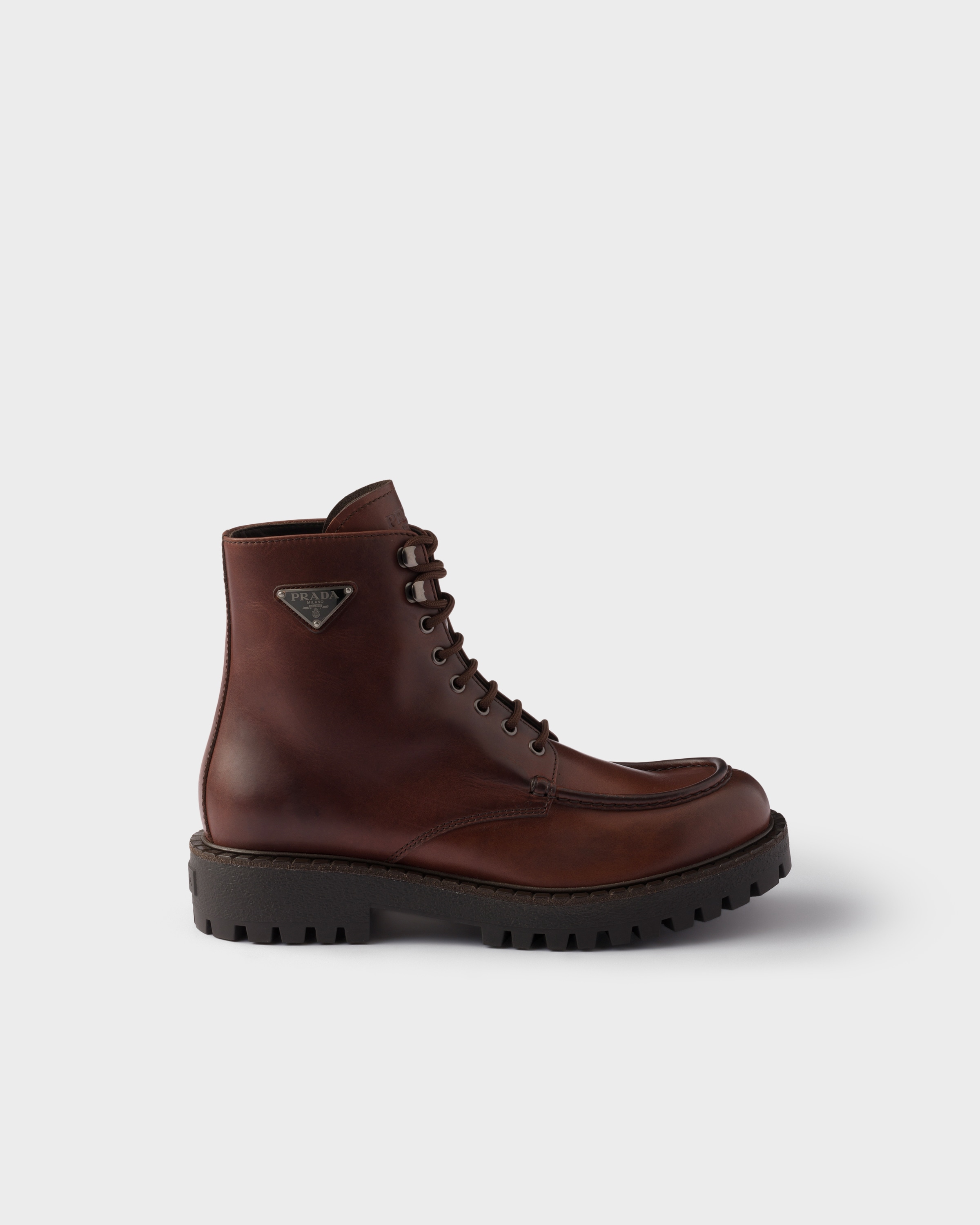 Prada Lace-up Lug-sole Boots In Black