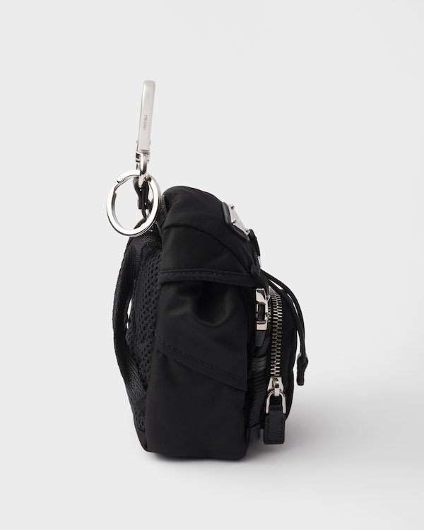 سلسلة مفاتيح بحلية متدلية لحقيبة بوشيه صغيرة من الرينايلون سلسلة مفاتيح بحلية متدلية لحقيبة بوشيه صغيرة من الرينايلون