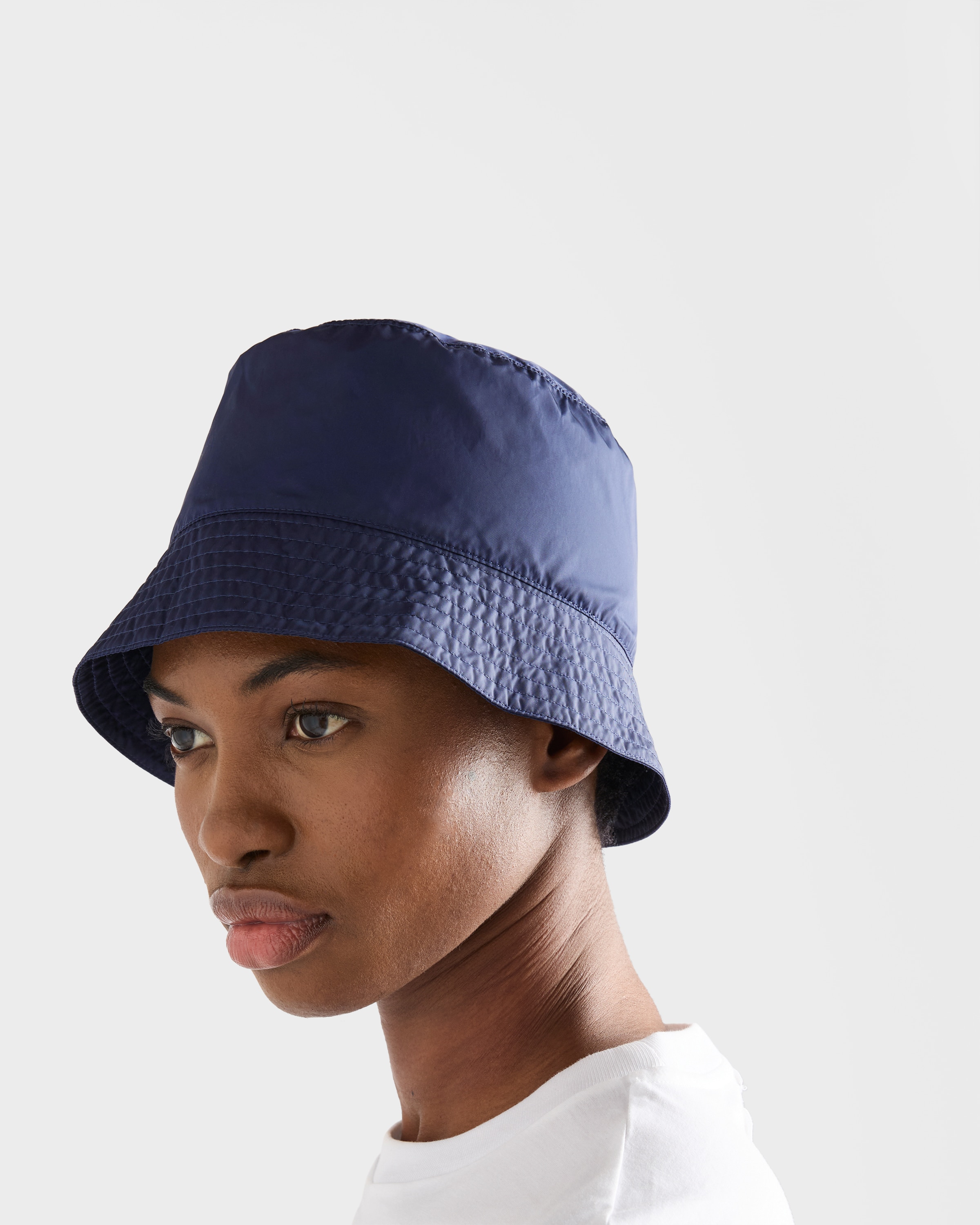 Baltic Blue Foldable Re-Nylon bucket hat | PRADA - United States