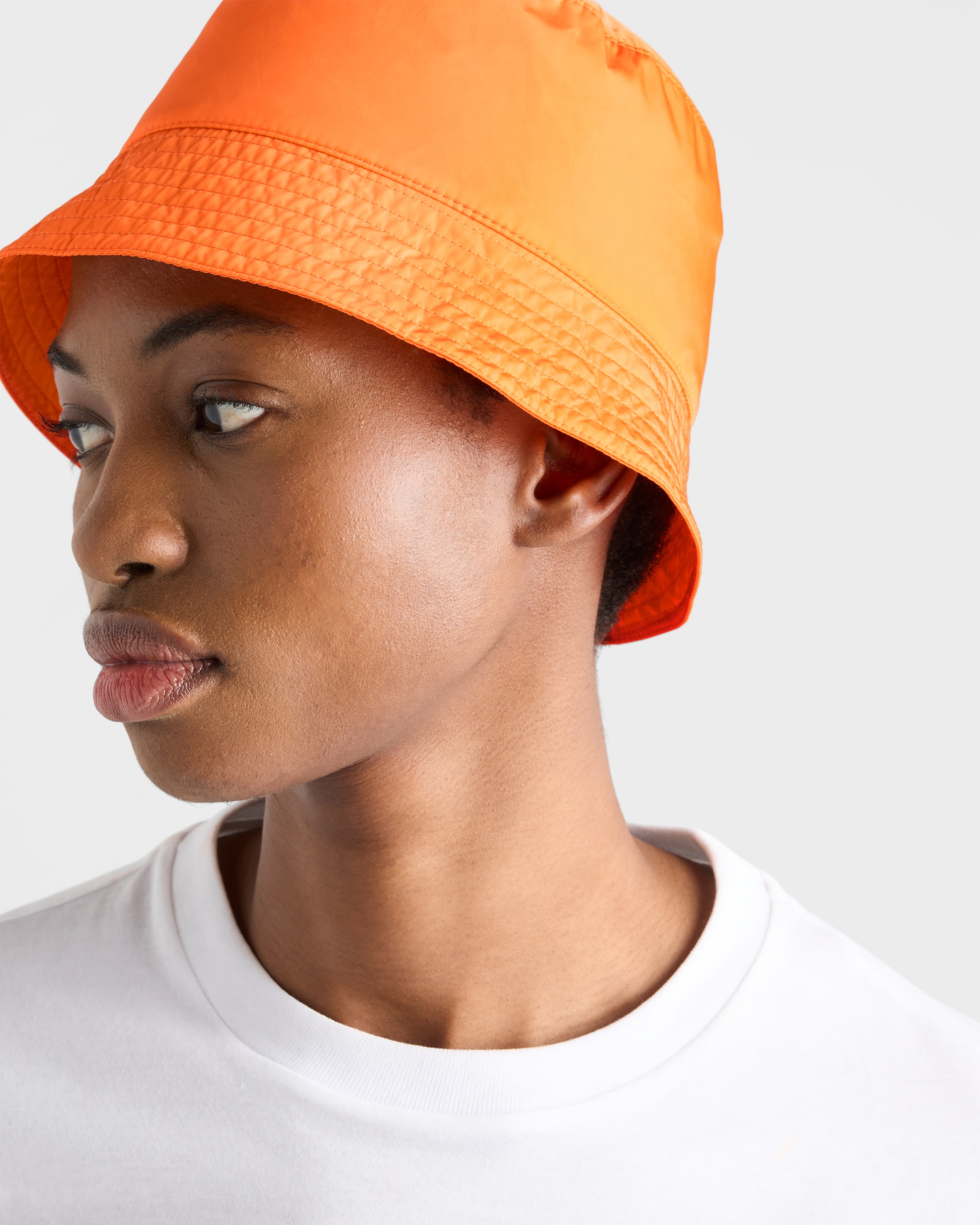 Orange Foldable Re-Nylon bucket hat | PRADA - United States