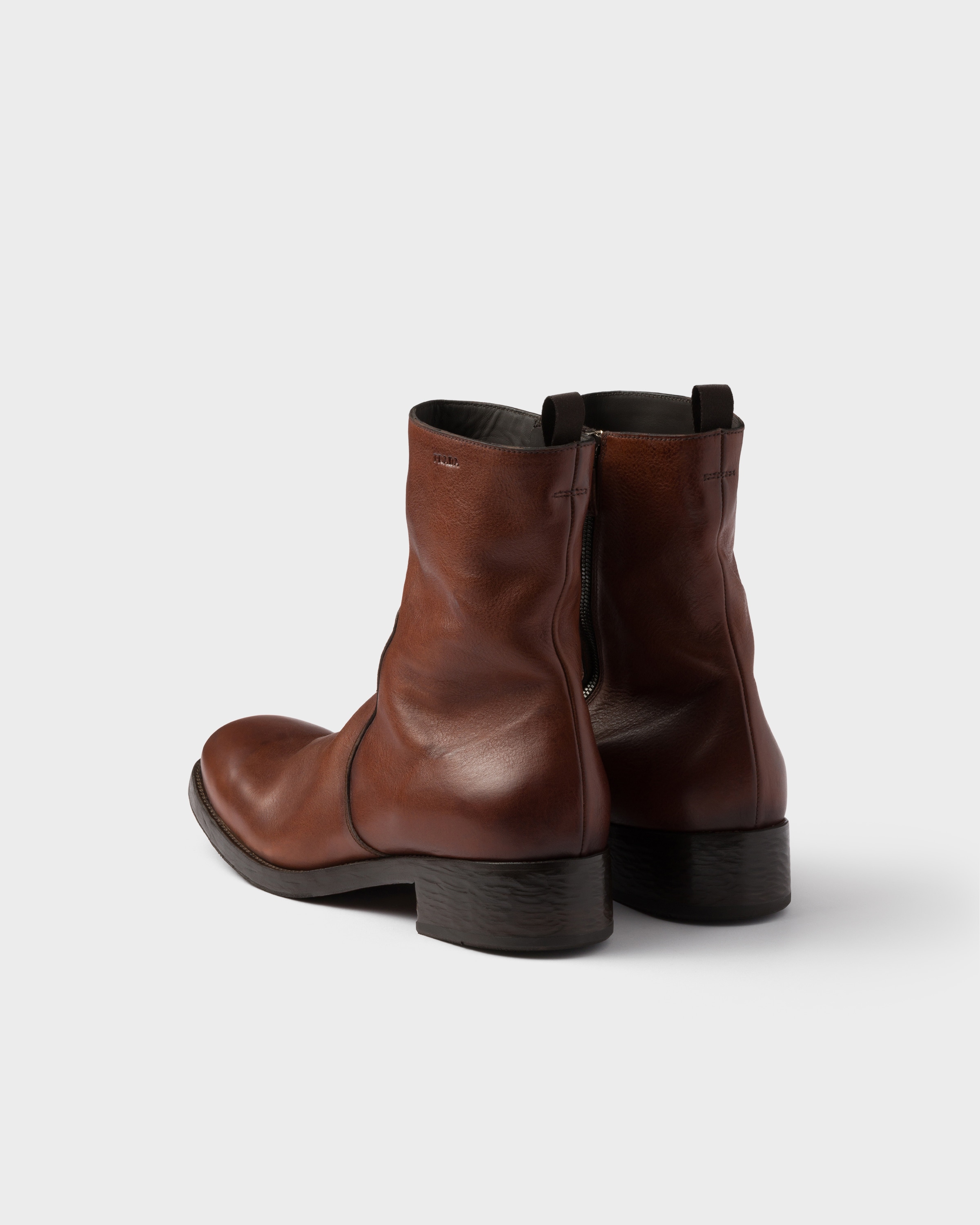 Prada Leather Zipper Boots In Animal Print