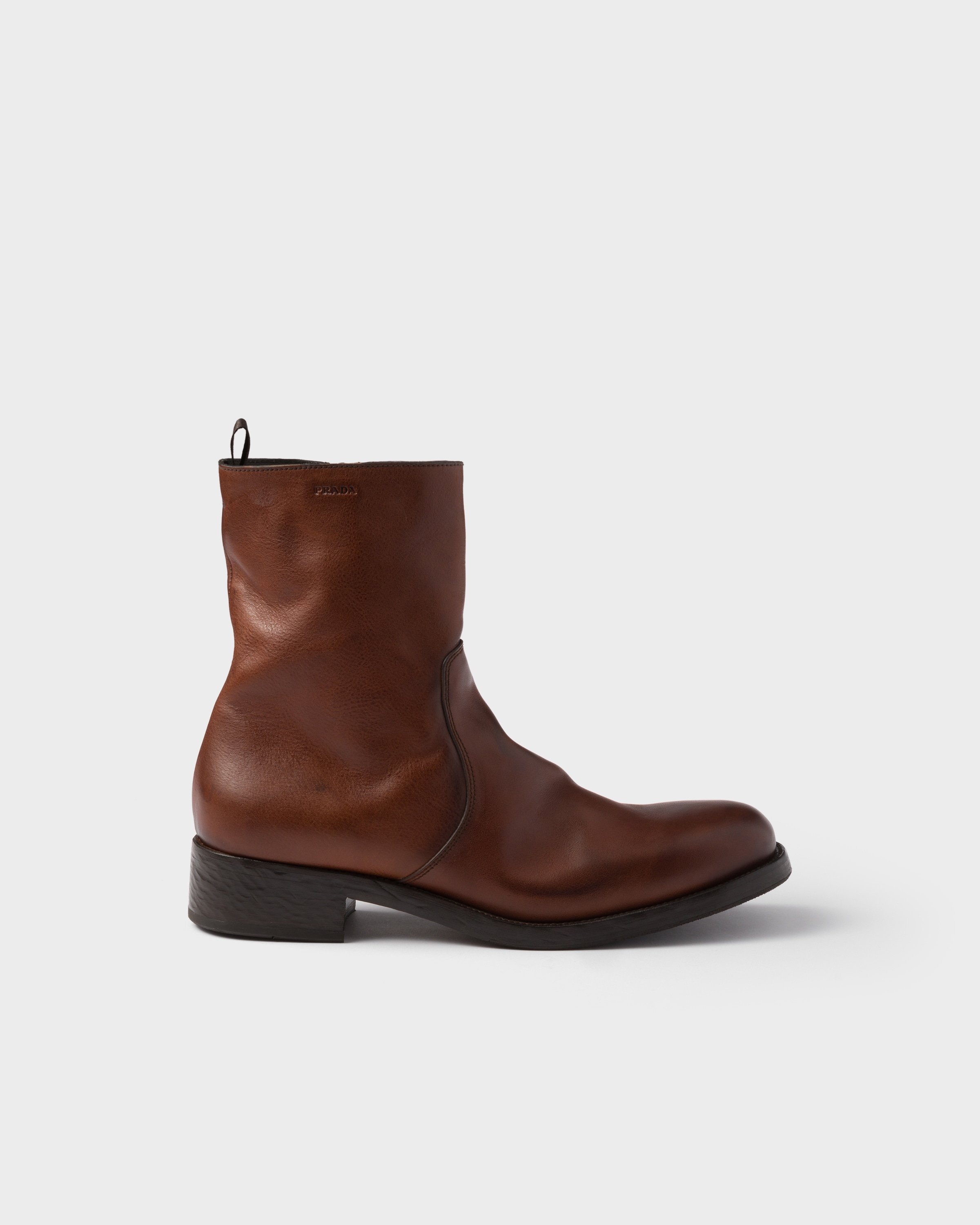 Prada Leather Zipper Boots In Animal Print