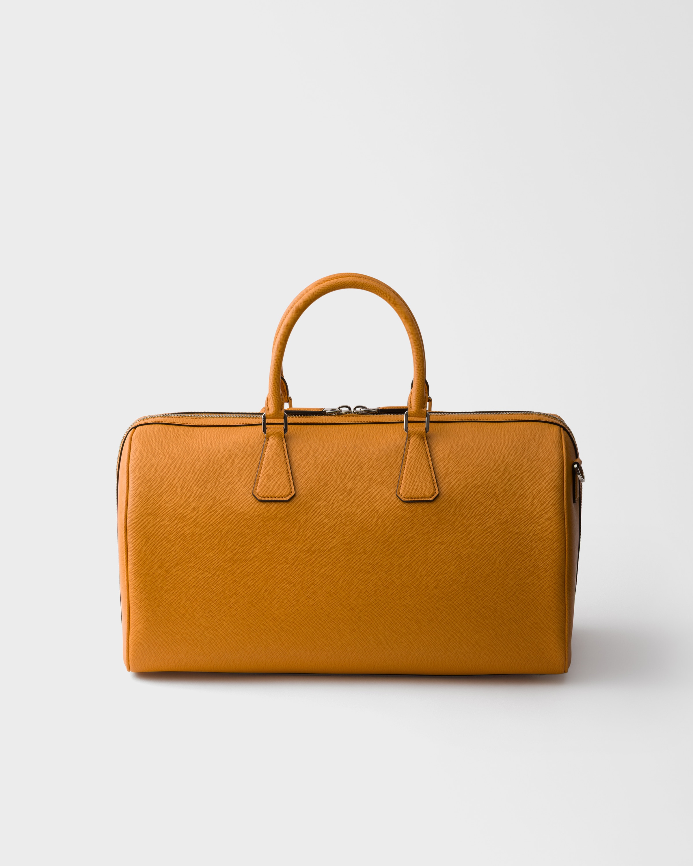 アンバー サフィアーノレザー トラベルバッグ | PRADA - 日本