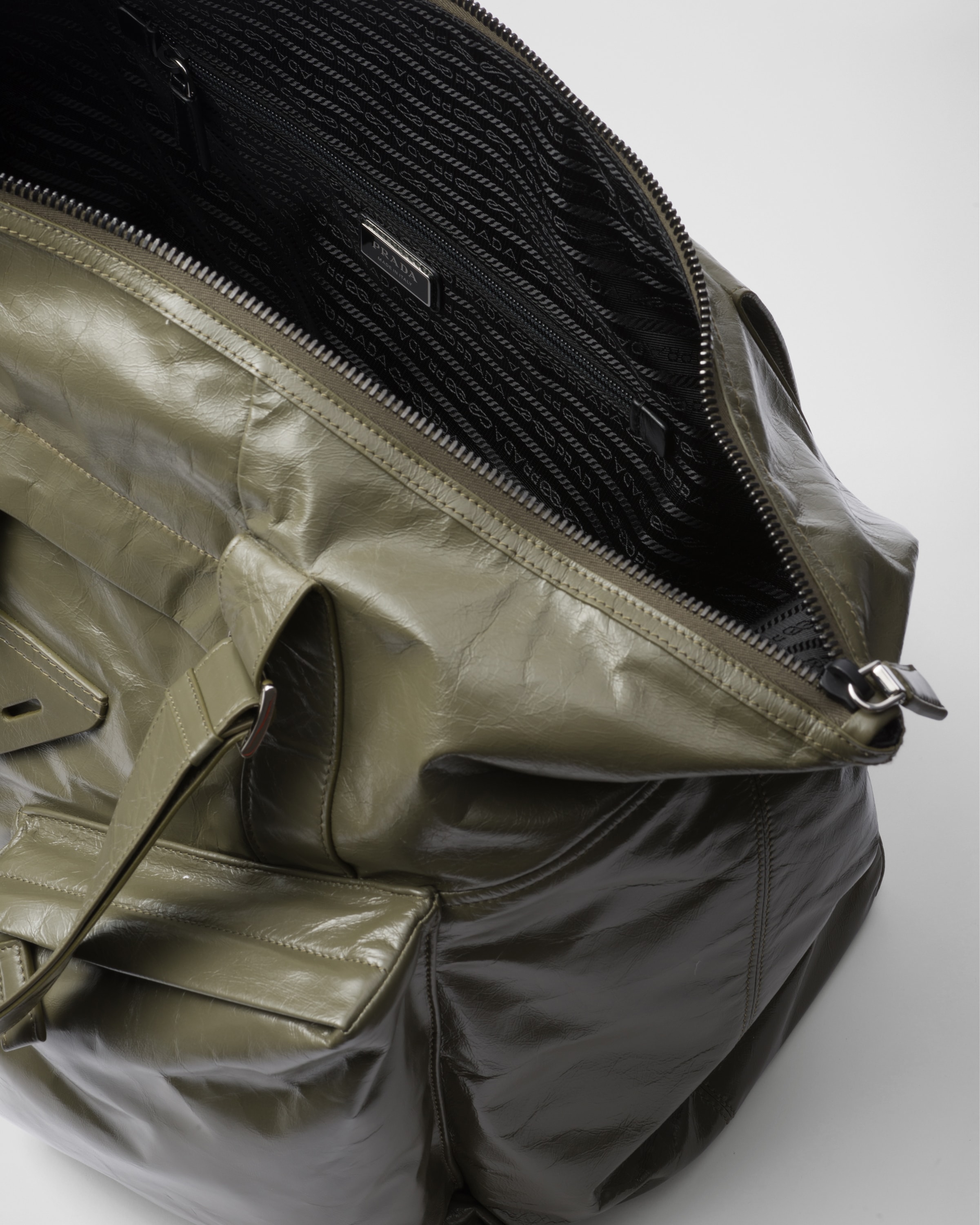 Prada leather travel bag deals