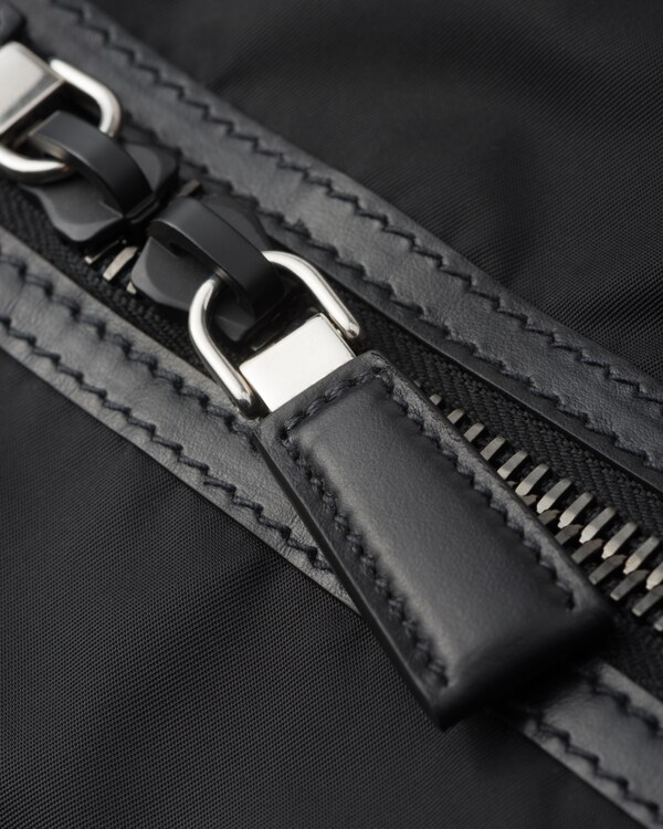 Re-Nylon and leather travel bag Re-Nylon and leather travel bag