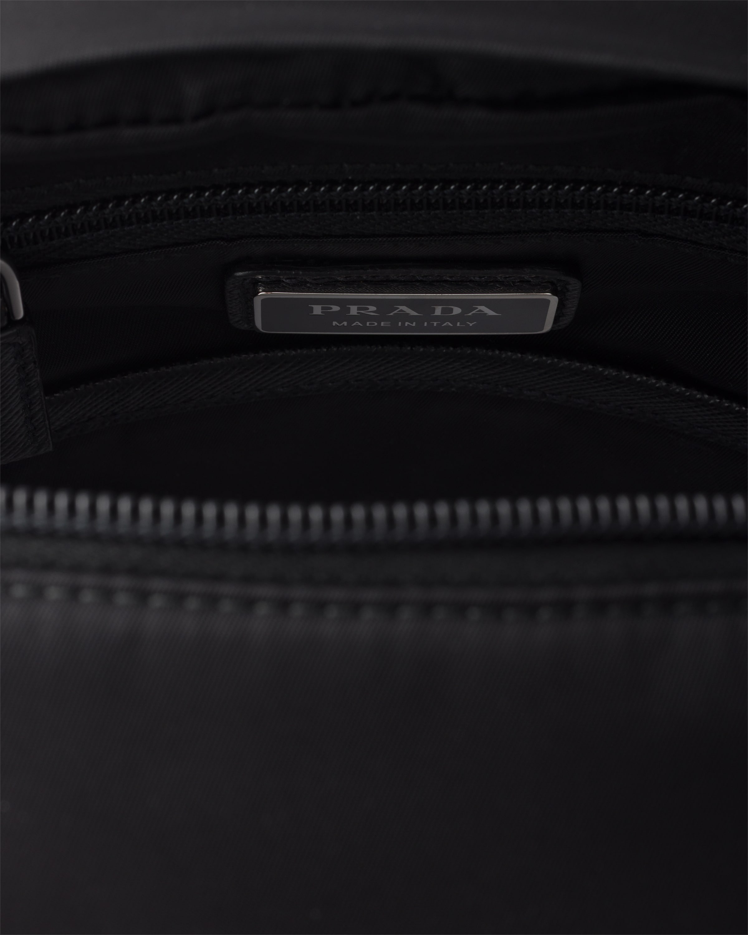Prada Structured Leather Backpack With Logo Zipper Closure