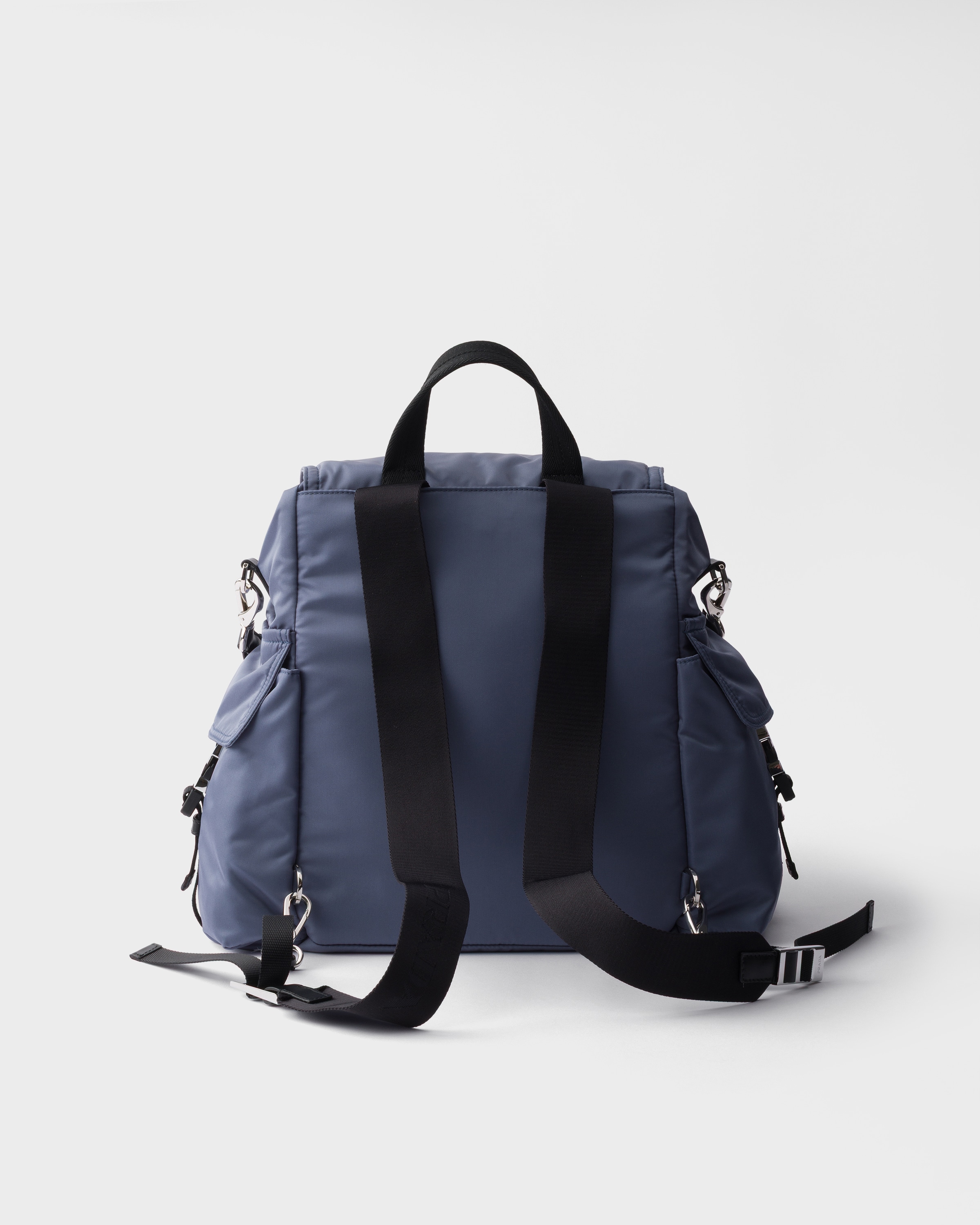 Aviation Blue Prada Explore Re-Nylon and leather backpack | PRADA