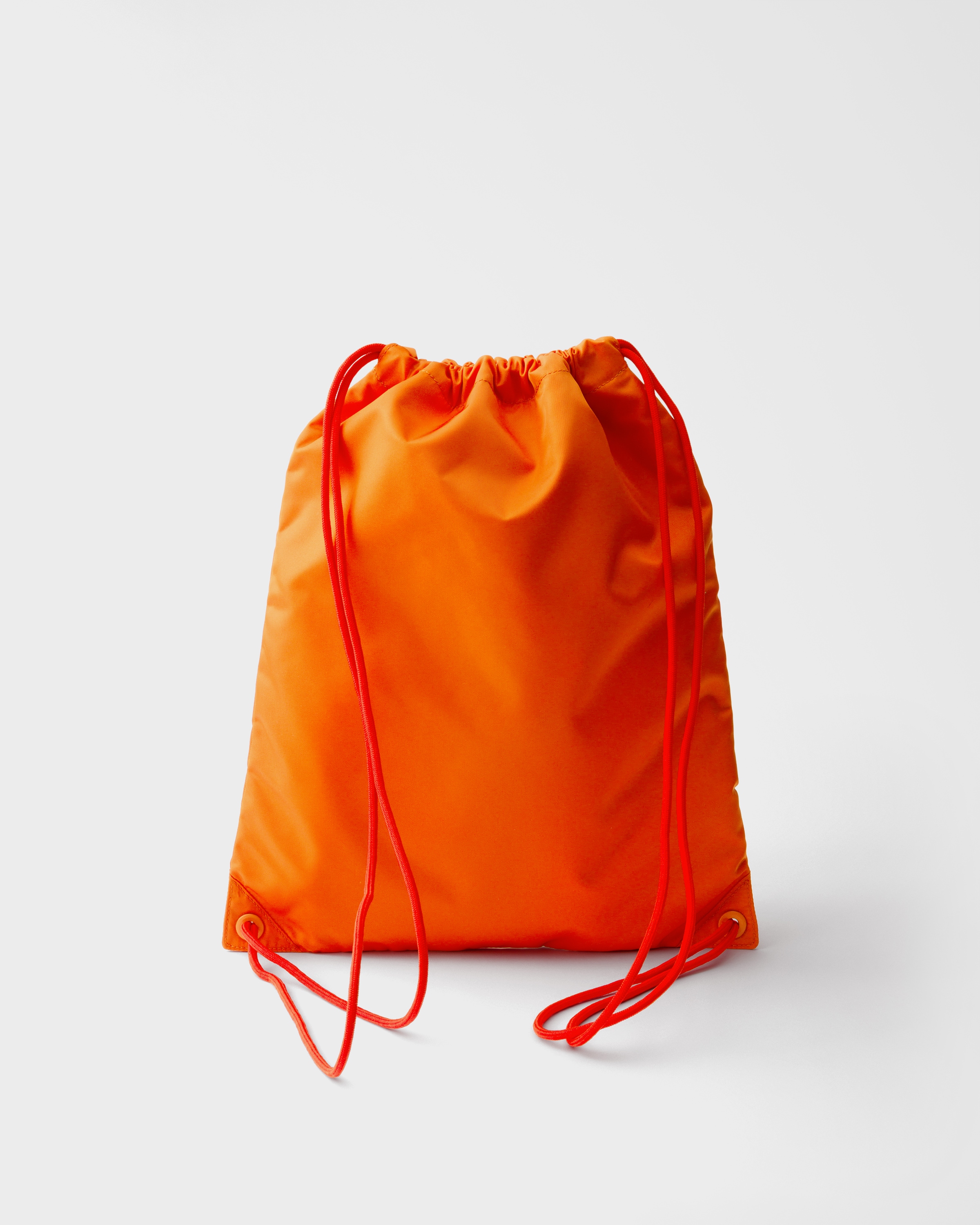 オレンジ Re-Nylon ドローストリング バックパック | PRADA - 日本
